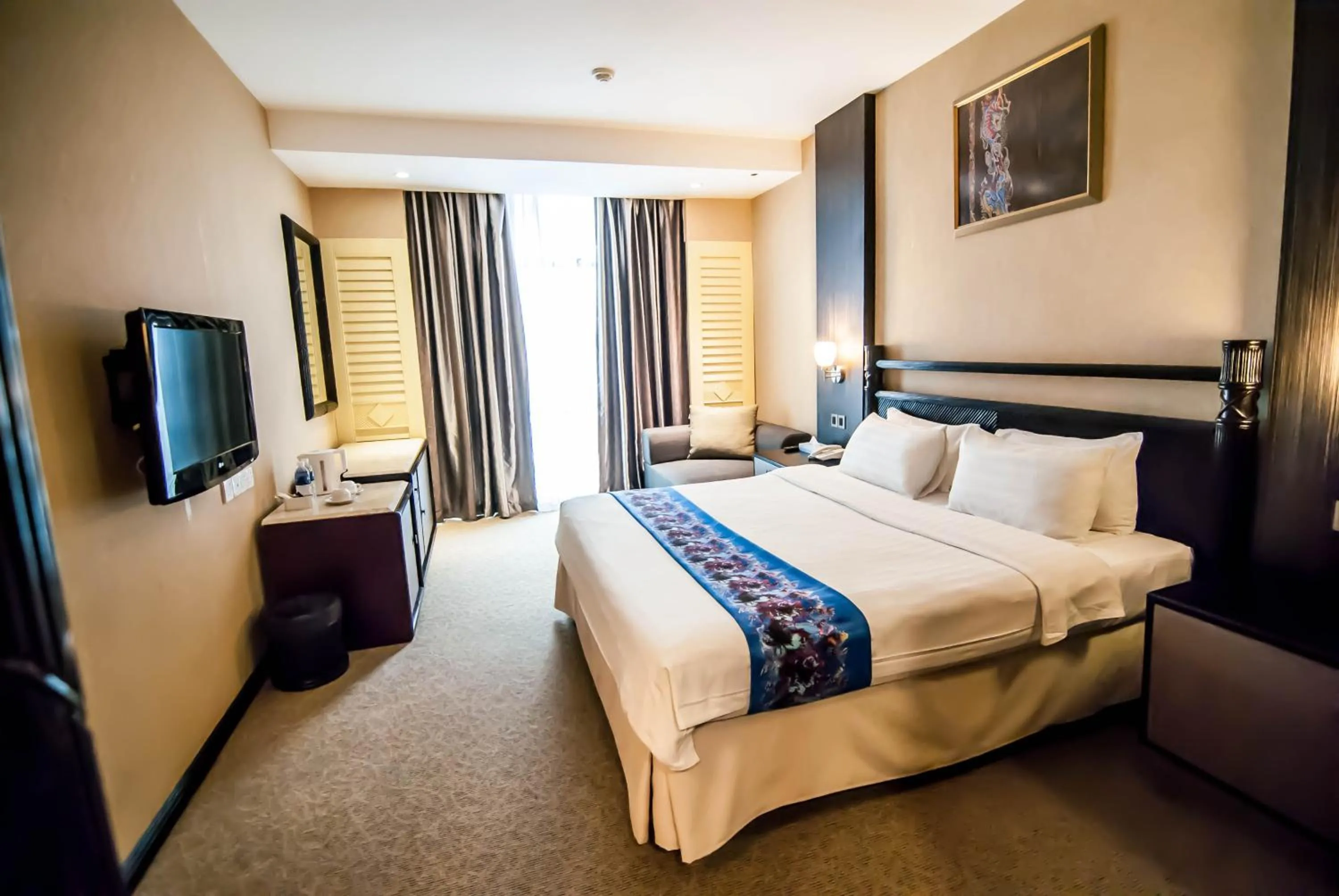 Bed in KK Times Square Hotel