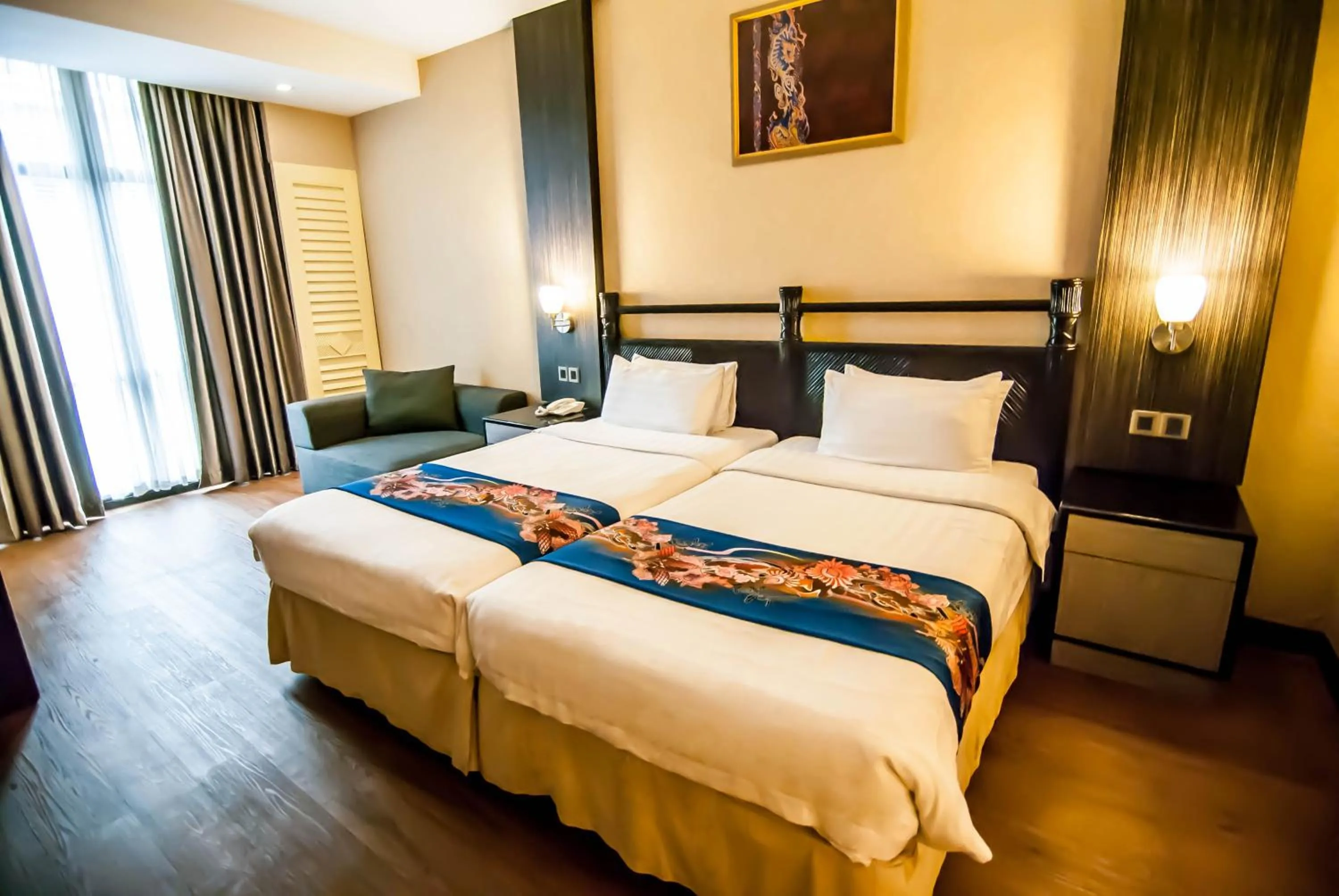 Bed in KK Times Square Hotel