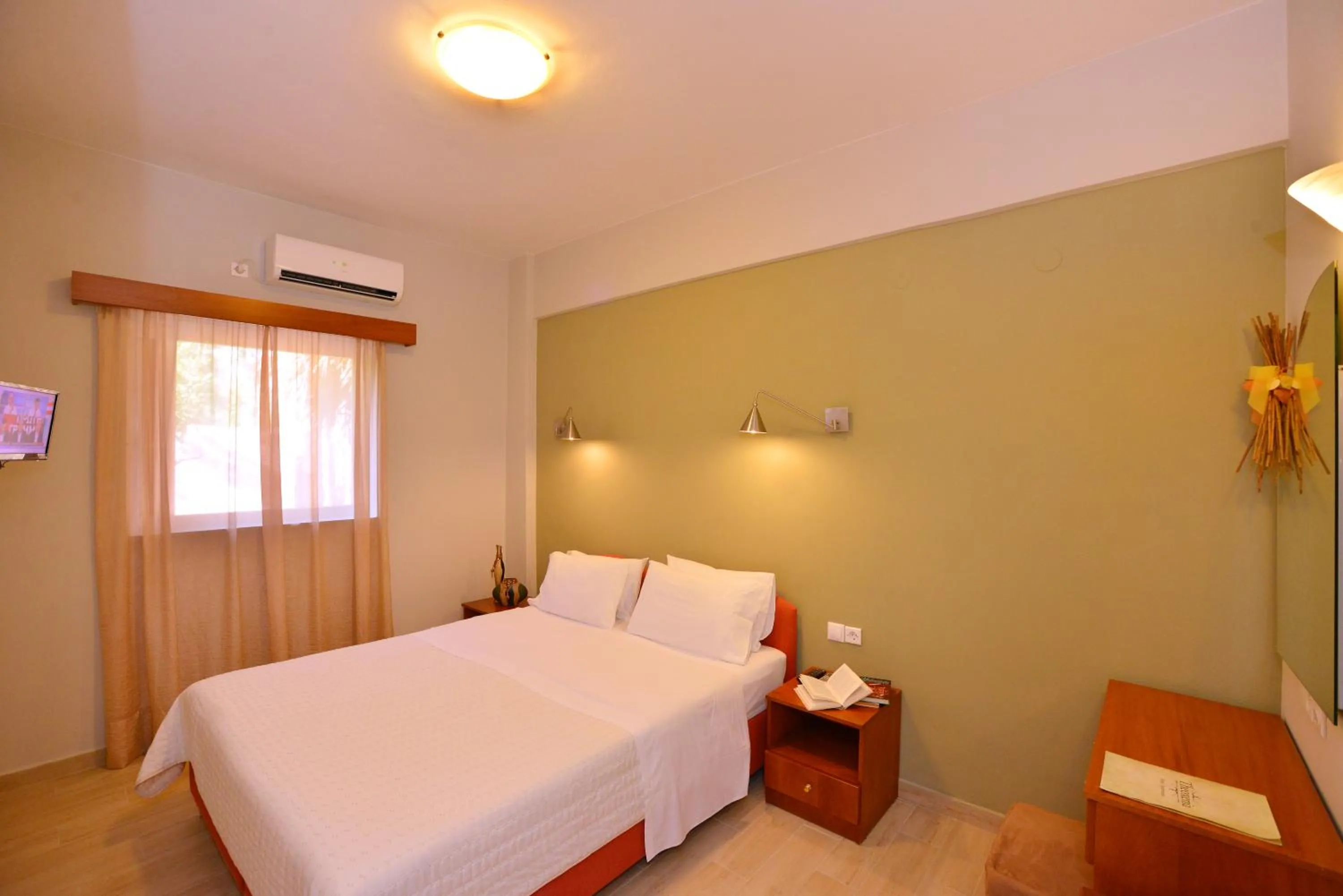 Bed in Theoxenia Hotel Apartments