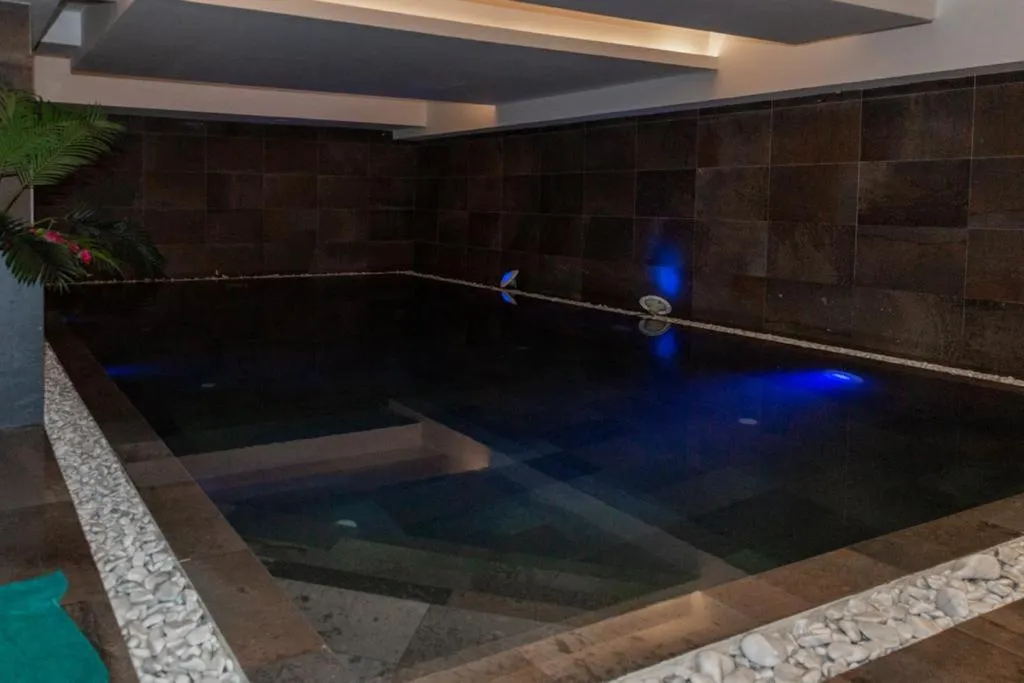 Swimming pool in The Village Boutique and SPA