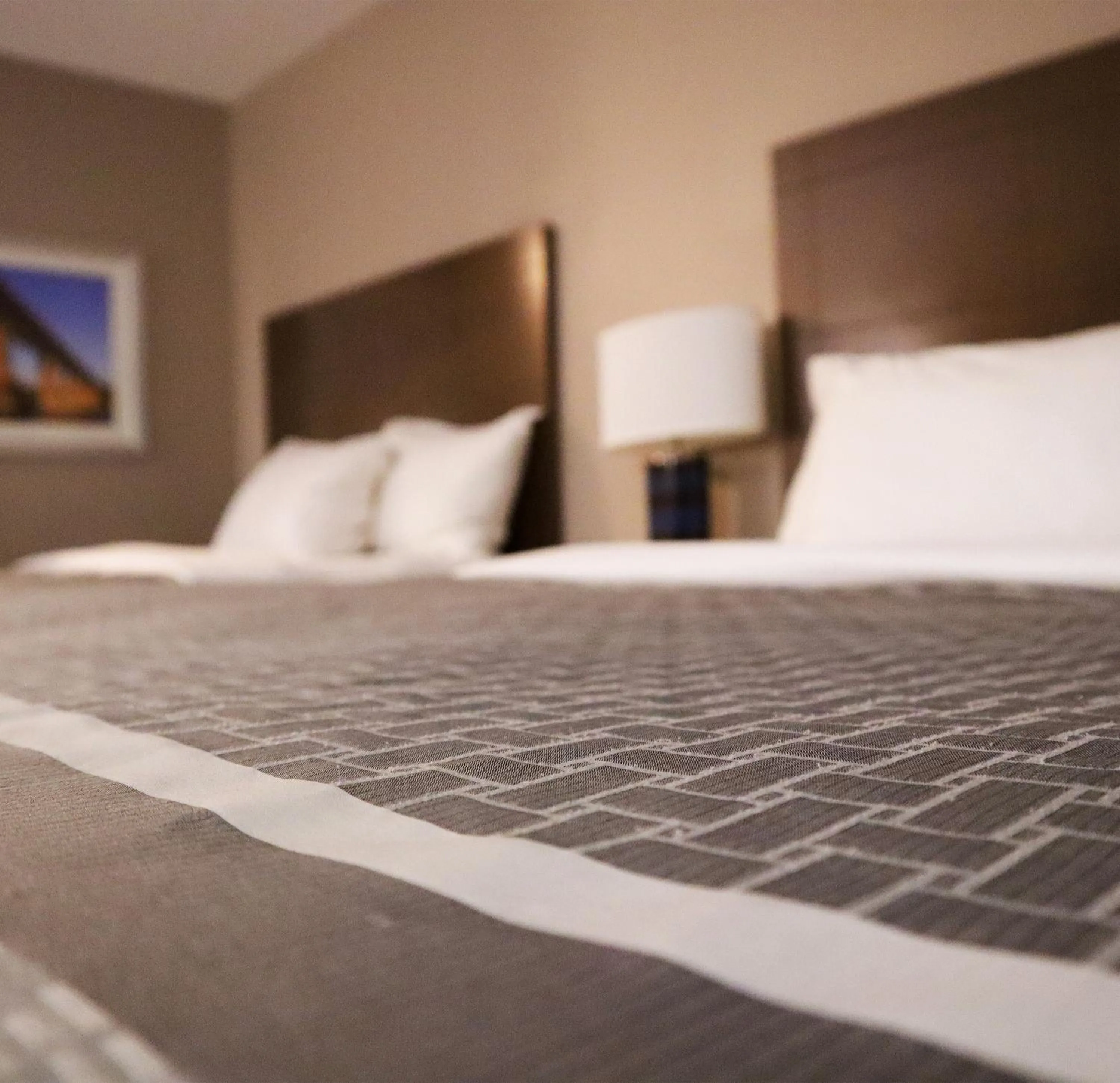 Bed in Travelodge Hotel by Wyndham Saskatoon
