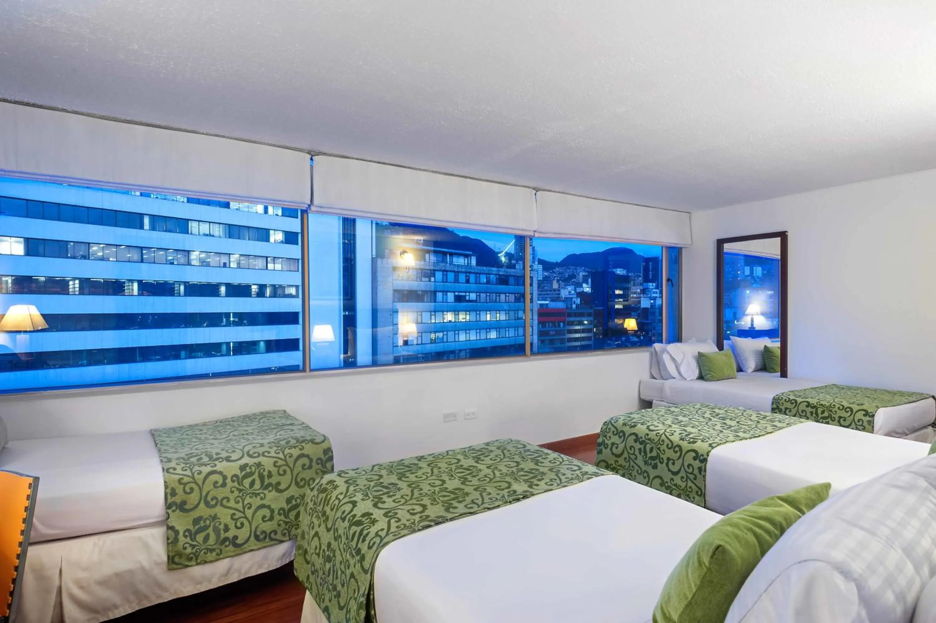 Photo of the whole room, Bed in Hotel Oceanía Bogotá Museo