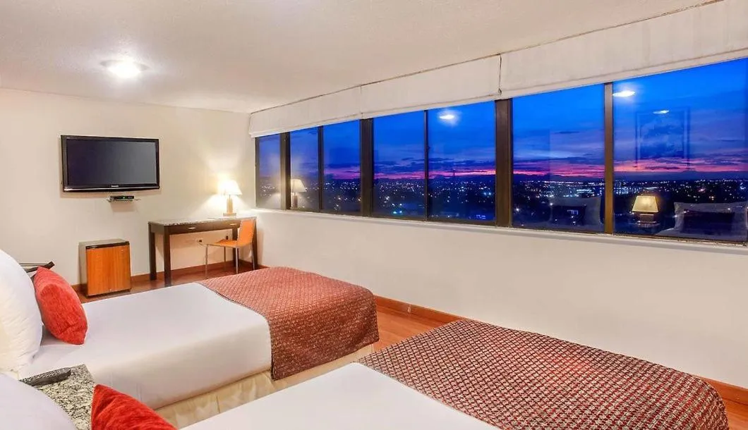 City view, Bed in Hotel Oceanía Bogotá Museo