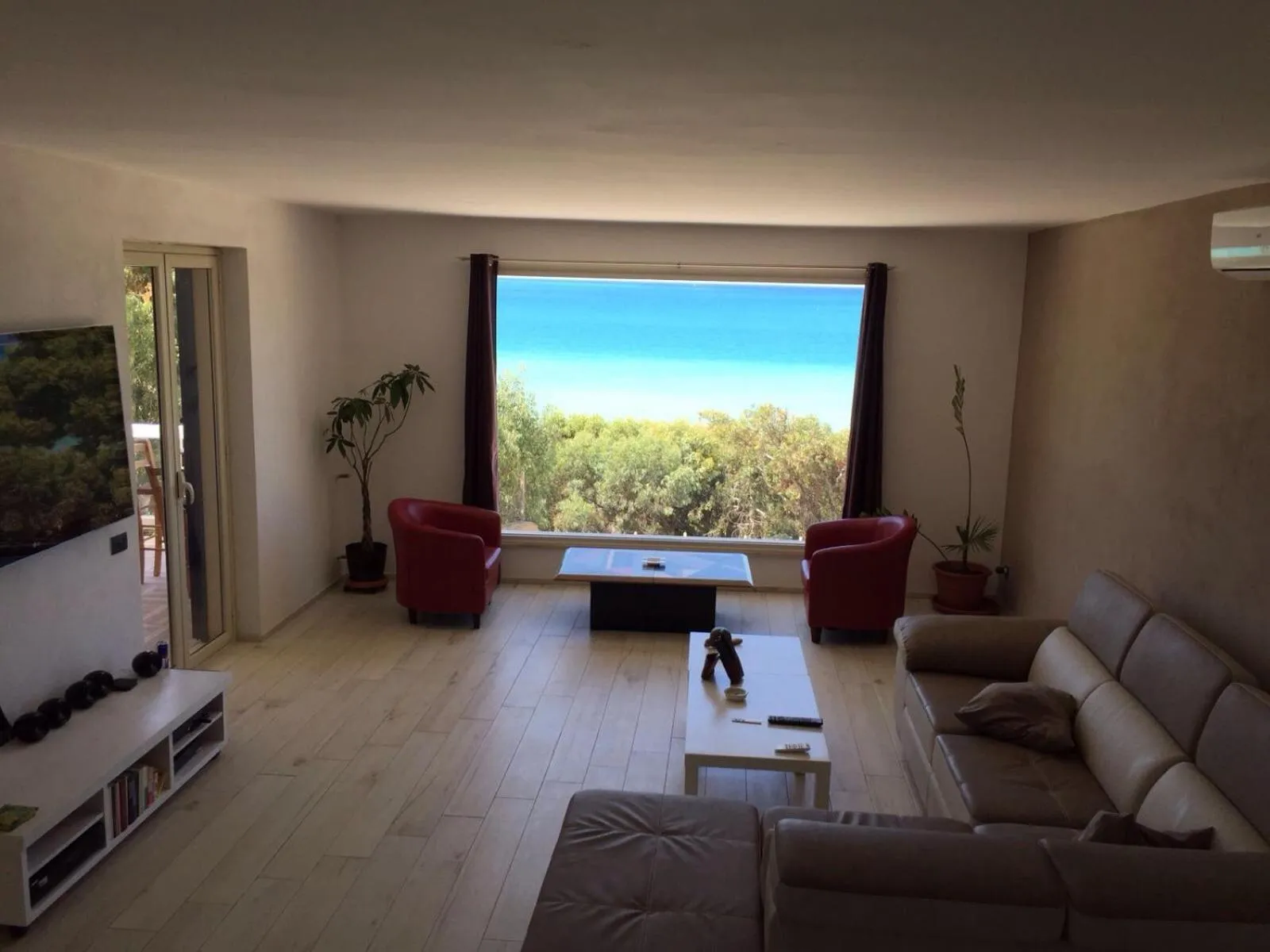 Communal lounge/ TV room in Locazione Turistica Il Tucano