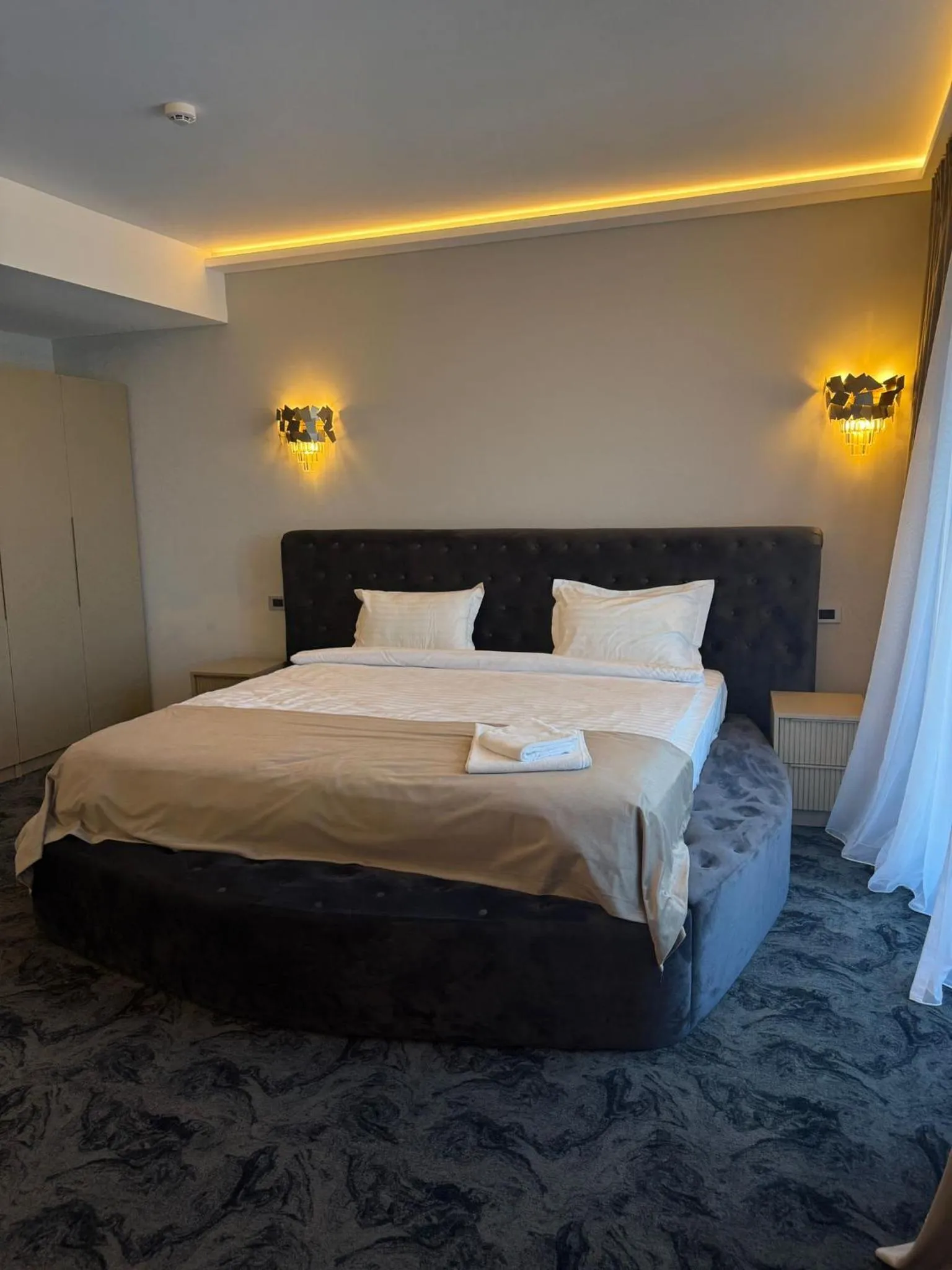 Bed in Black Tulip Hotel