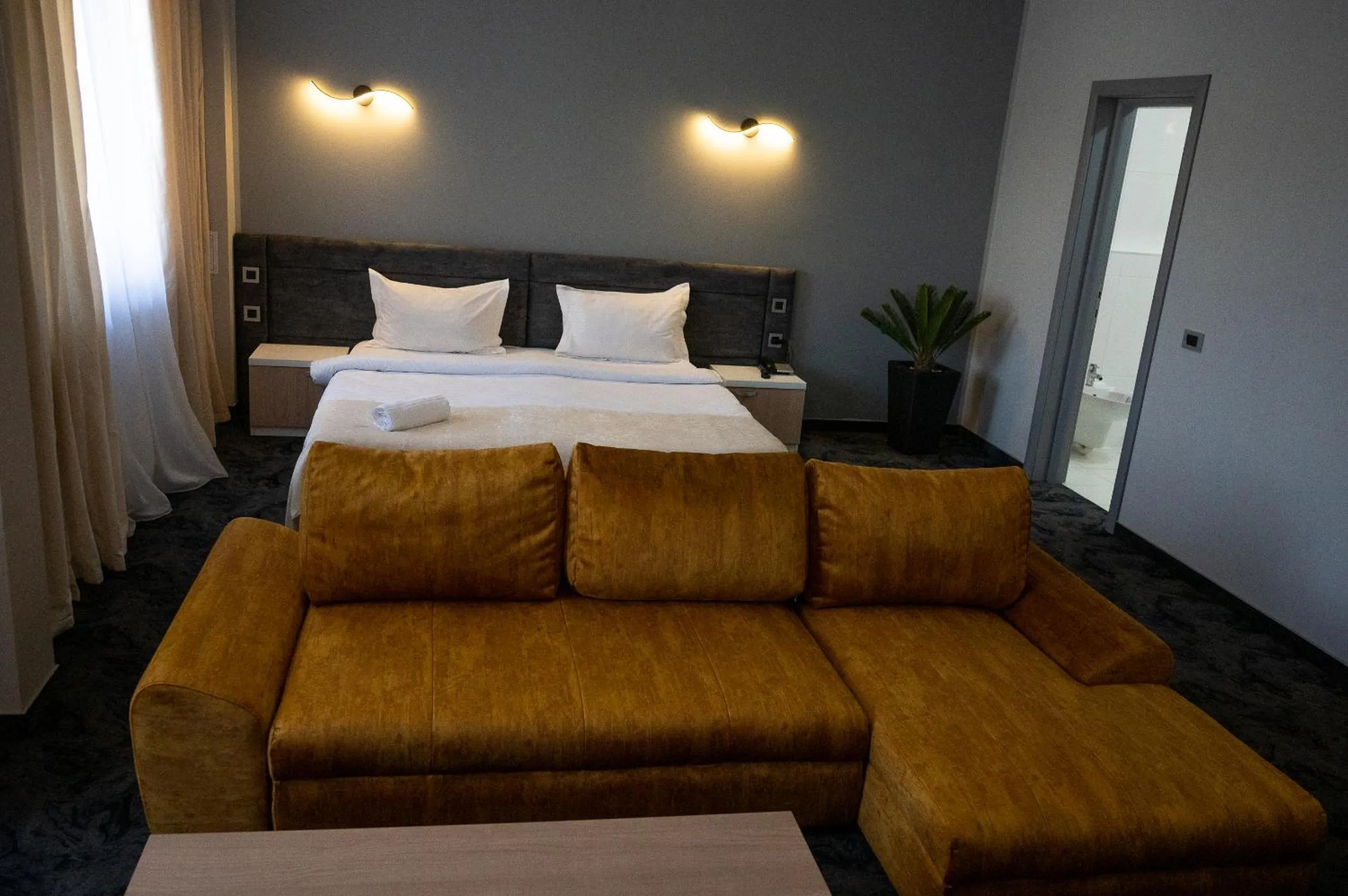 Bed in Black Tulip Hotel