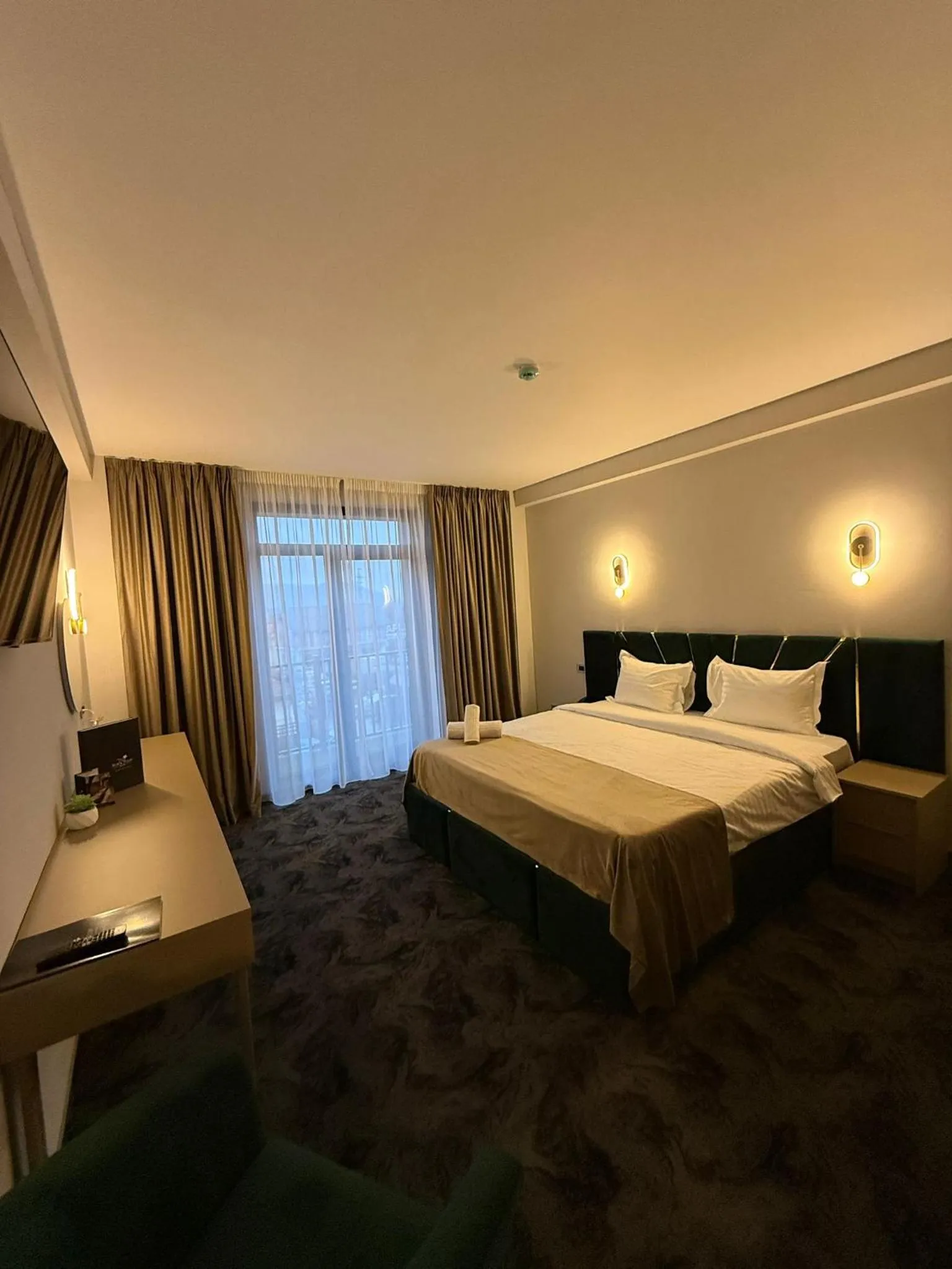 Bed in Black Tulip Hotel