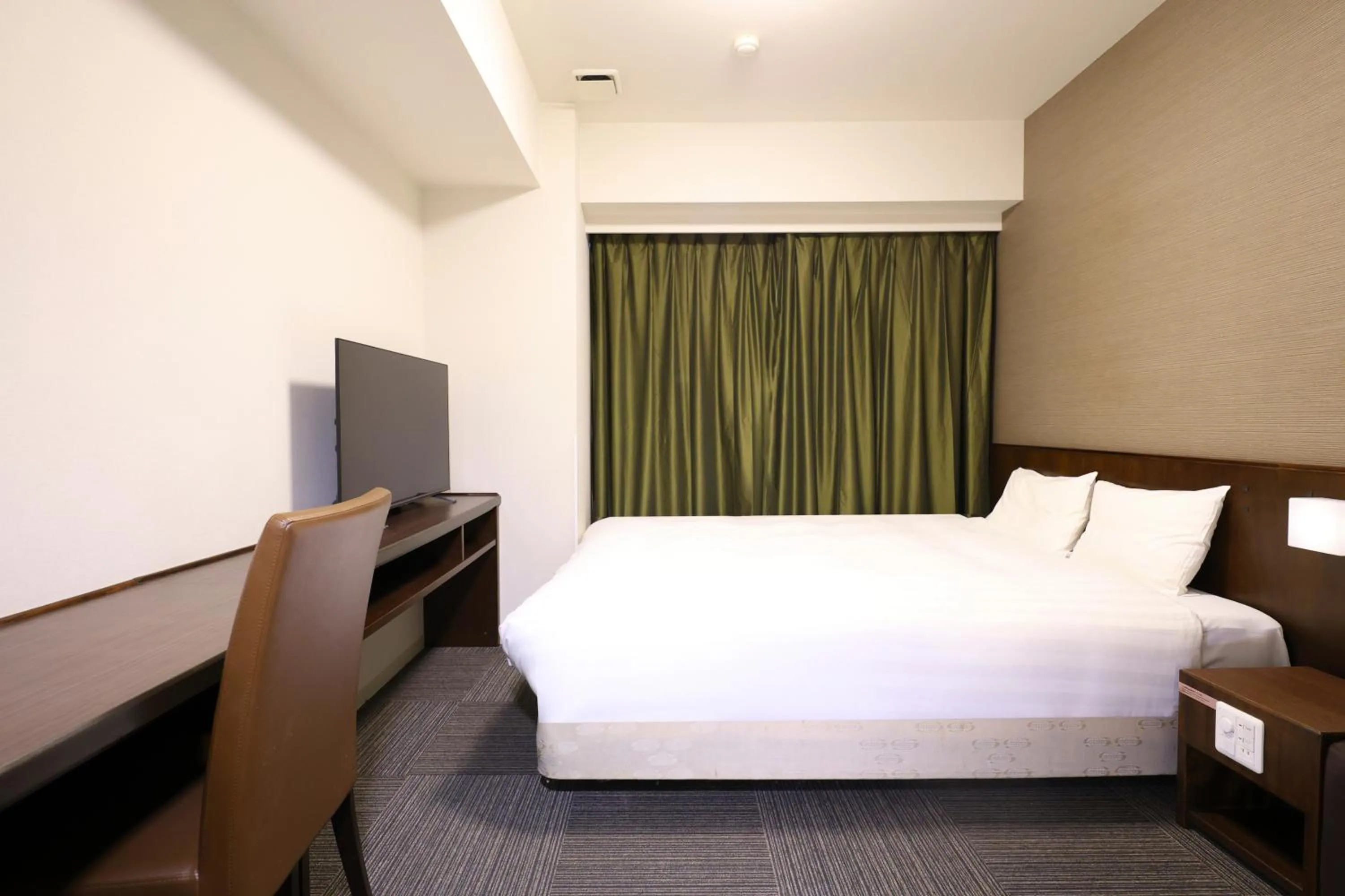 Bed in Dormy Inn Matsumoto