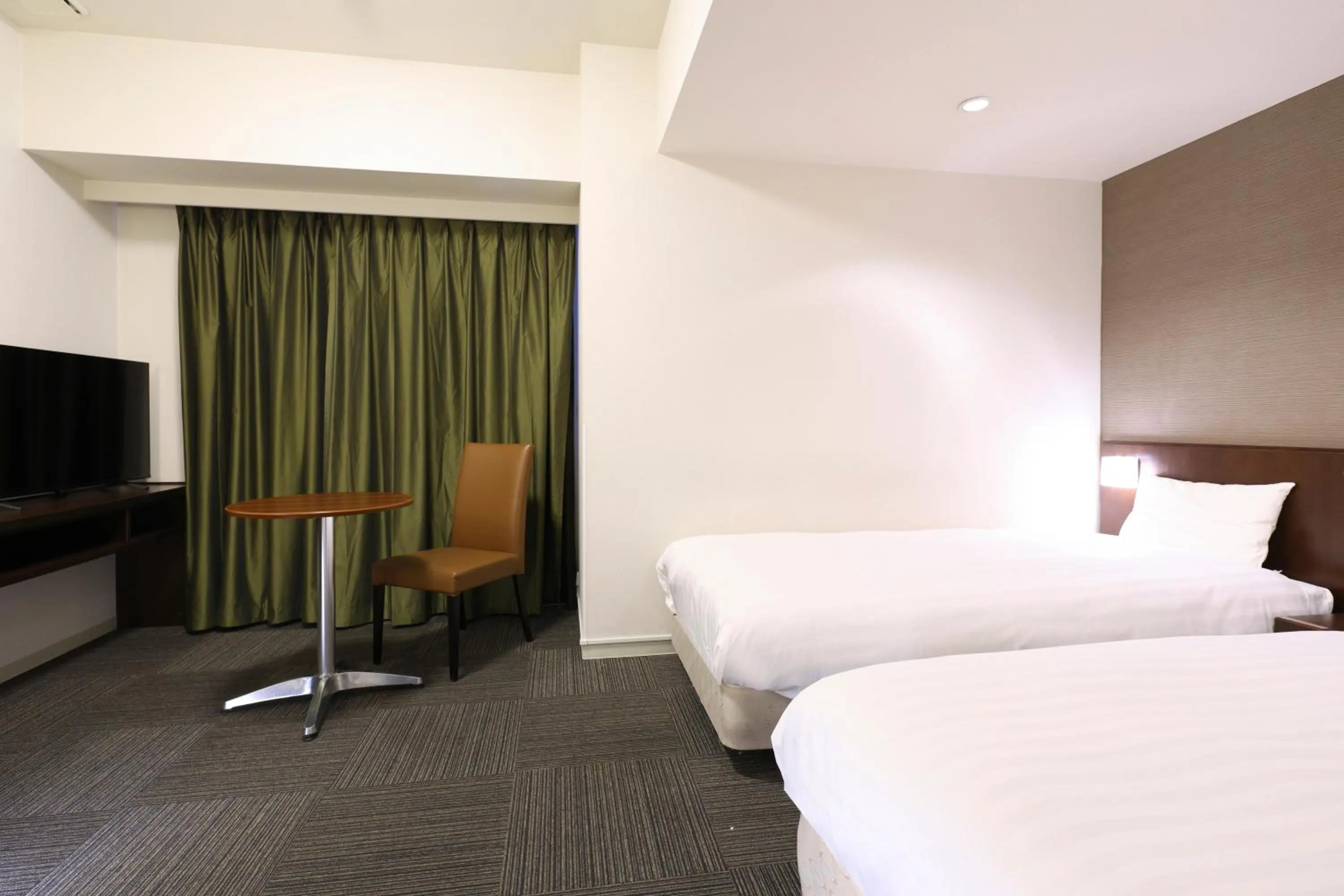 Bed in Dormy Inn Matsumoto