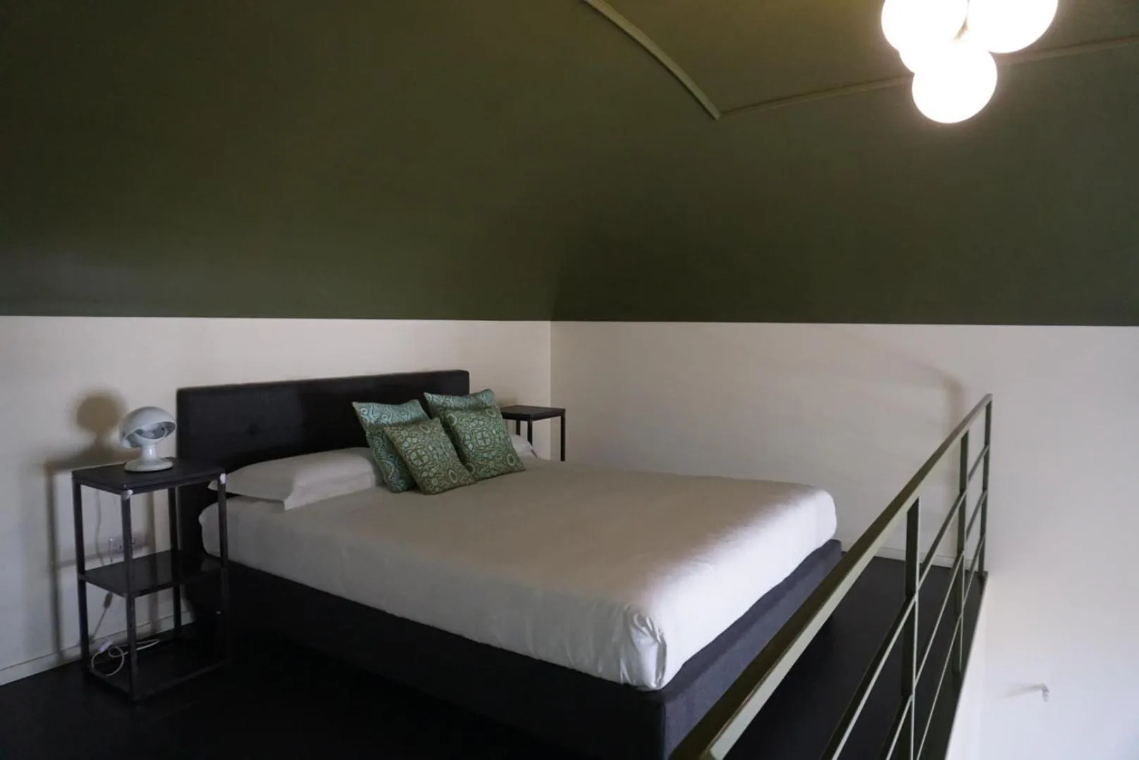 Bed in Avolio Tailored Rooms