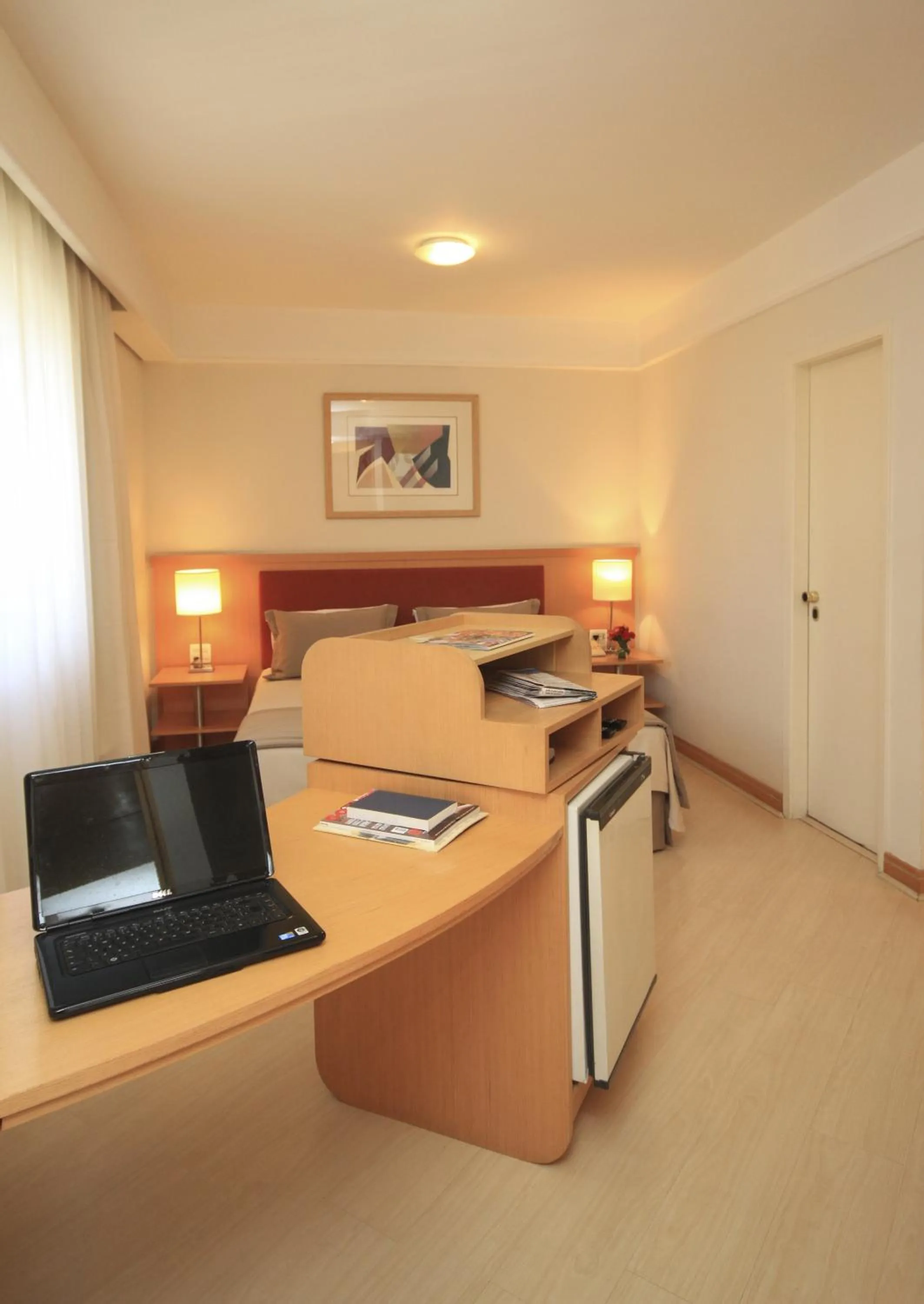 Seating area, Bed in Bienal Suítes