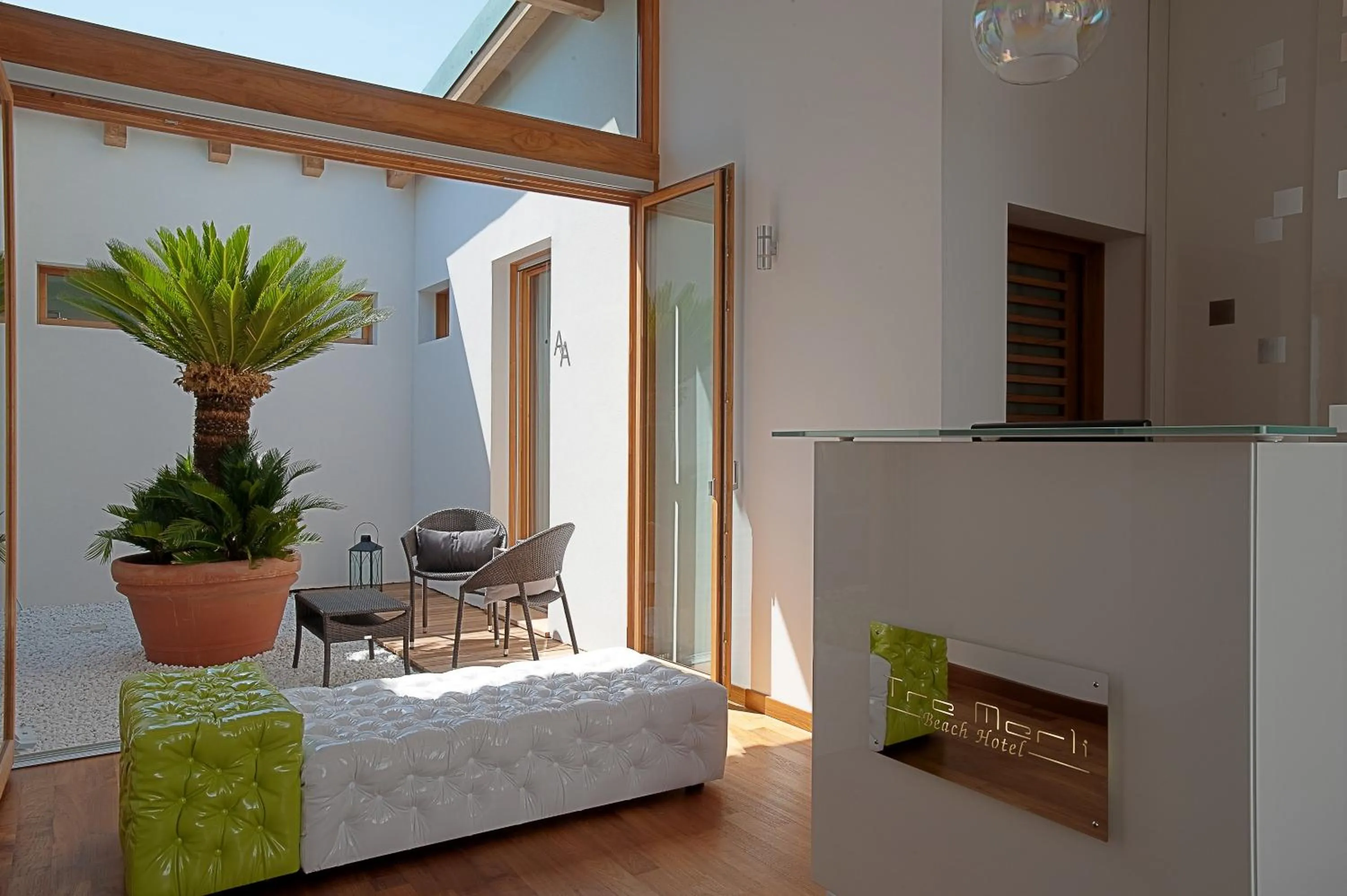 Lobby or reception in Tre Merli Beach Hotel