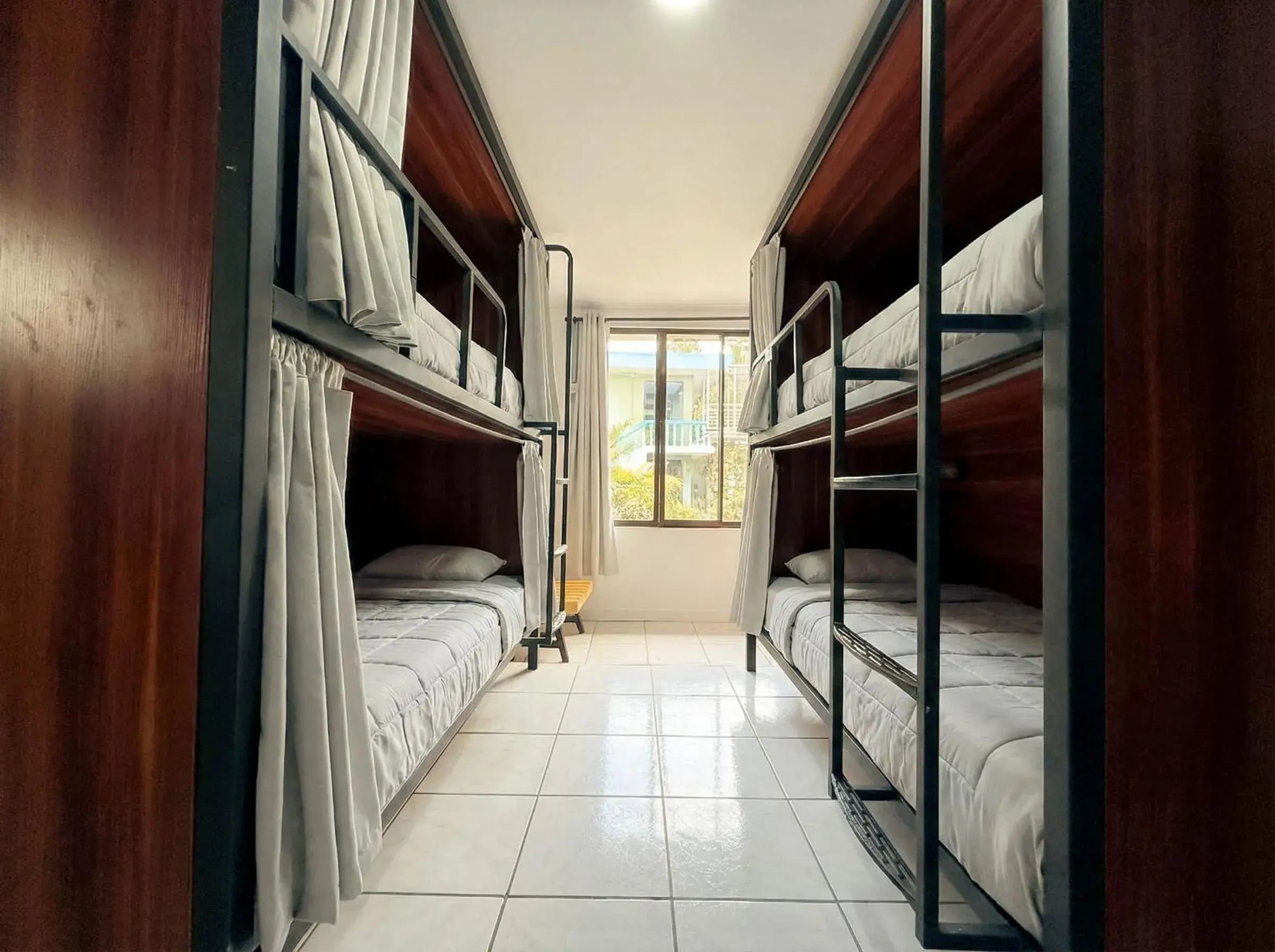 Bed in 4-Bed Female Dormitory Room in Viajero La Fortuna Hostel Bed in 4-Bed Female Dormitory Room in Viajero La Fortuna Hostel