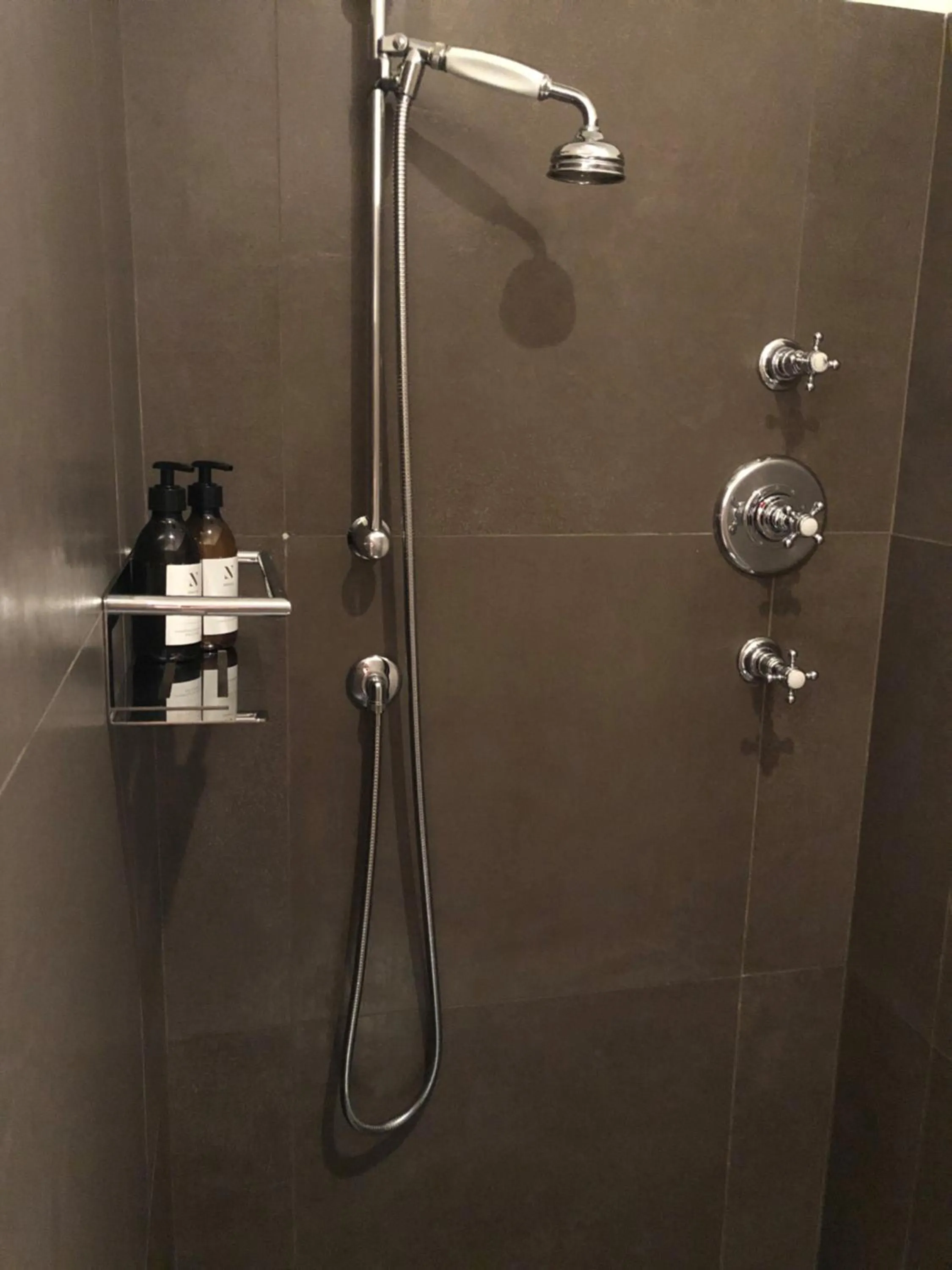 Shower in Grand Hôtel De Cala Rossa & Spa Nucca