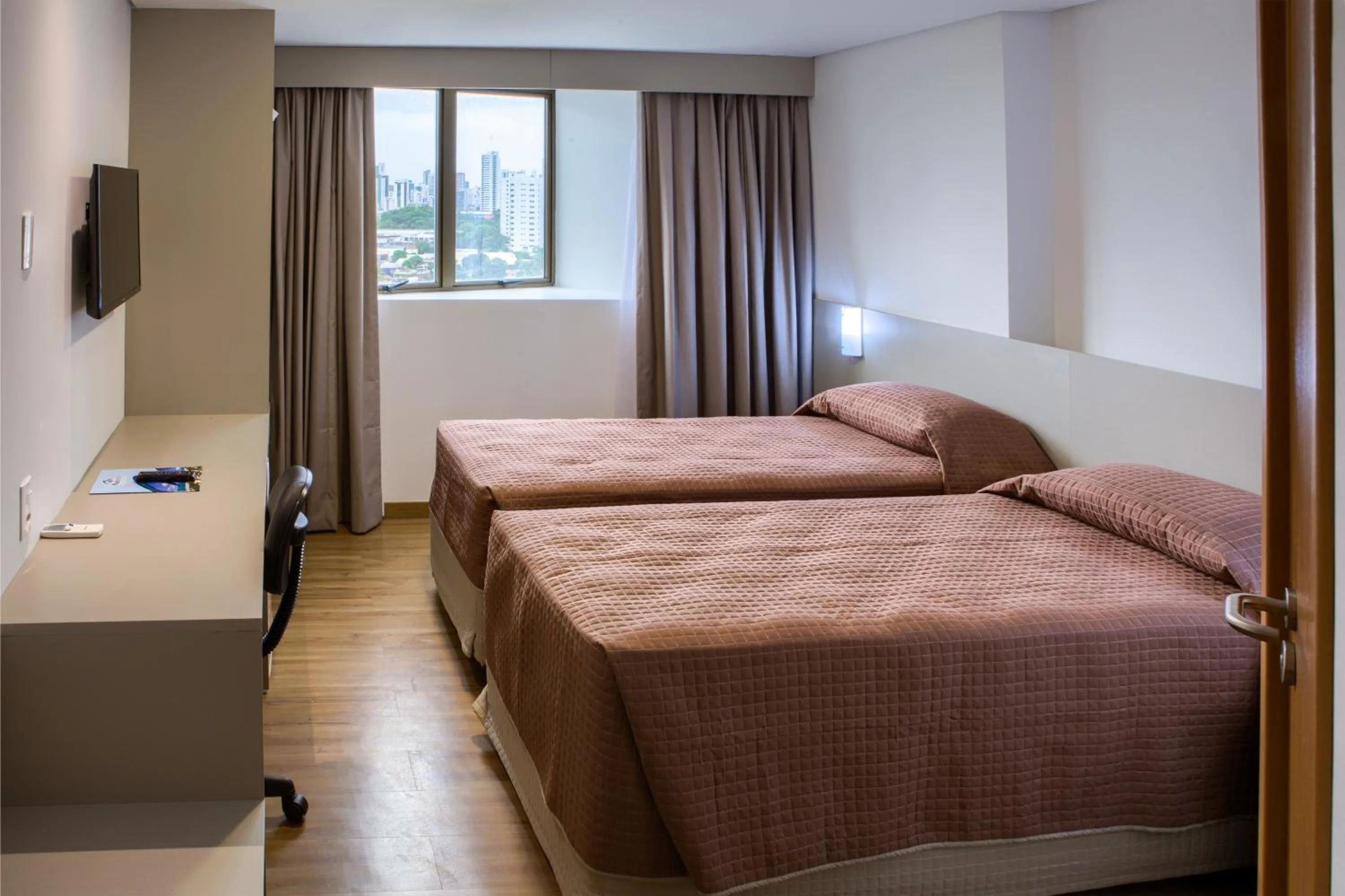 Photo of the whole room, Bed in Marante Executive Hotel