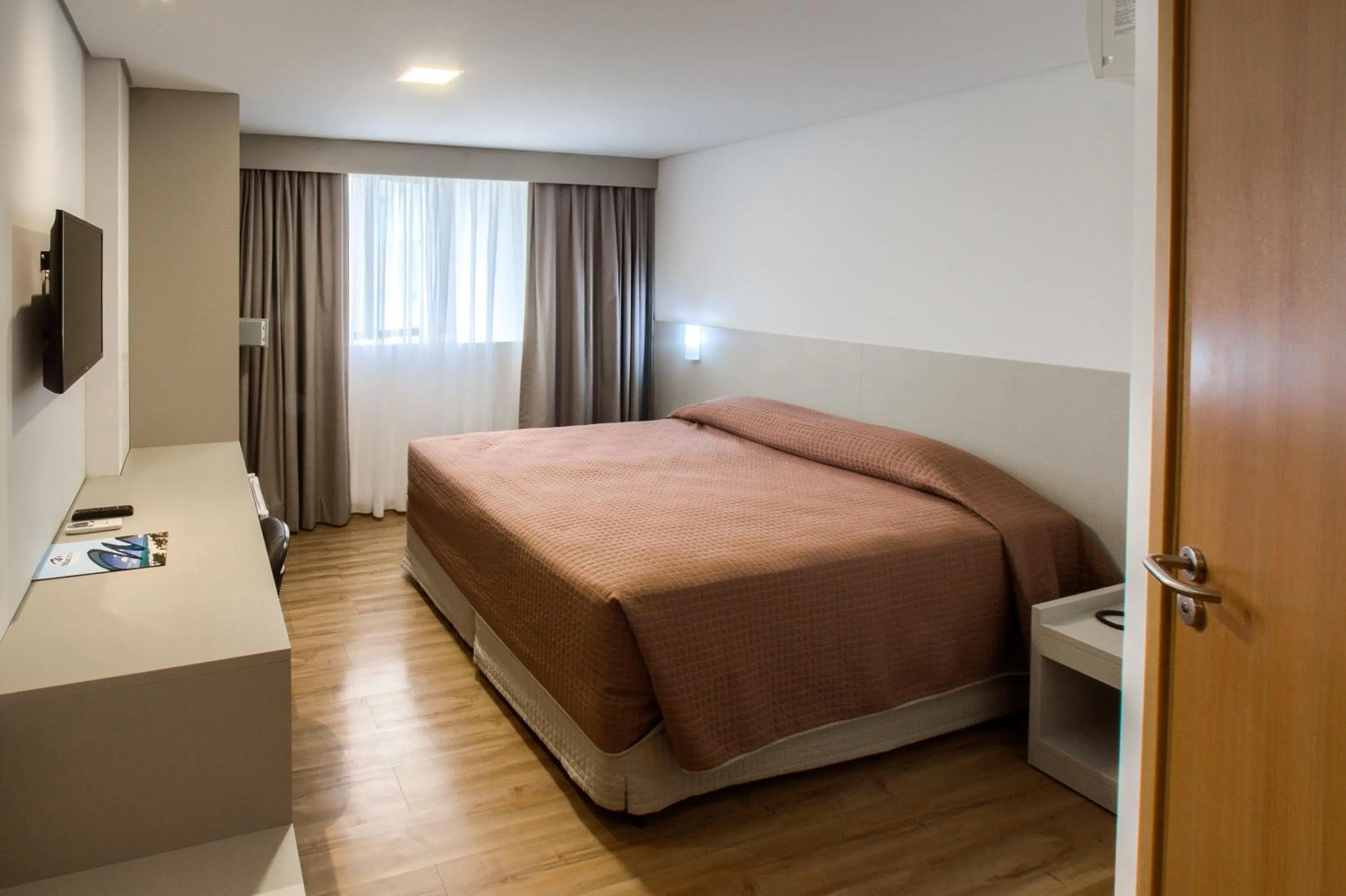 Property building, Bed in Marante Executive Hotel