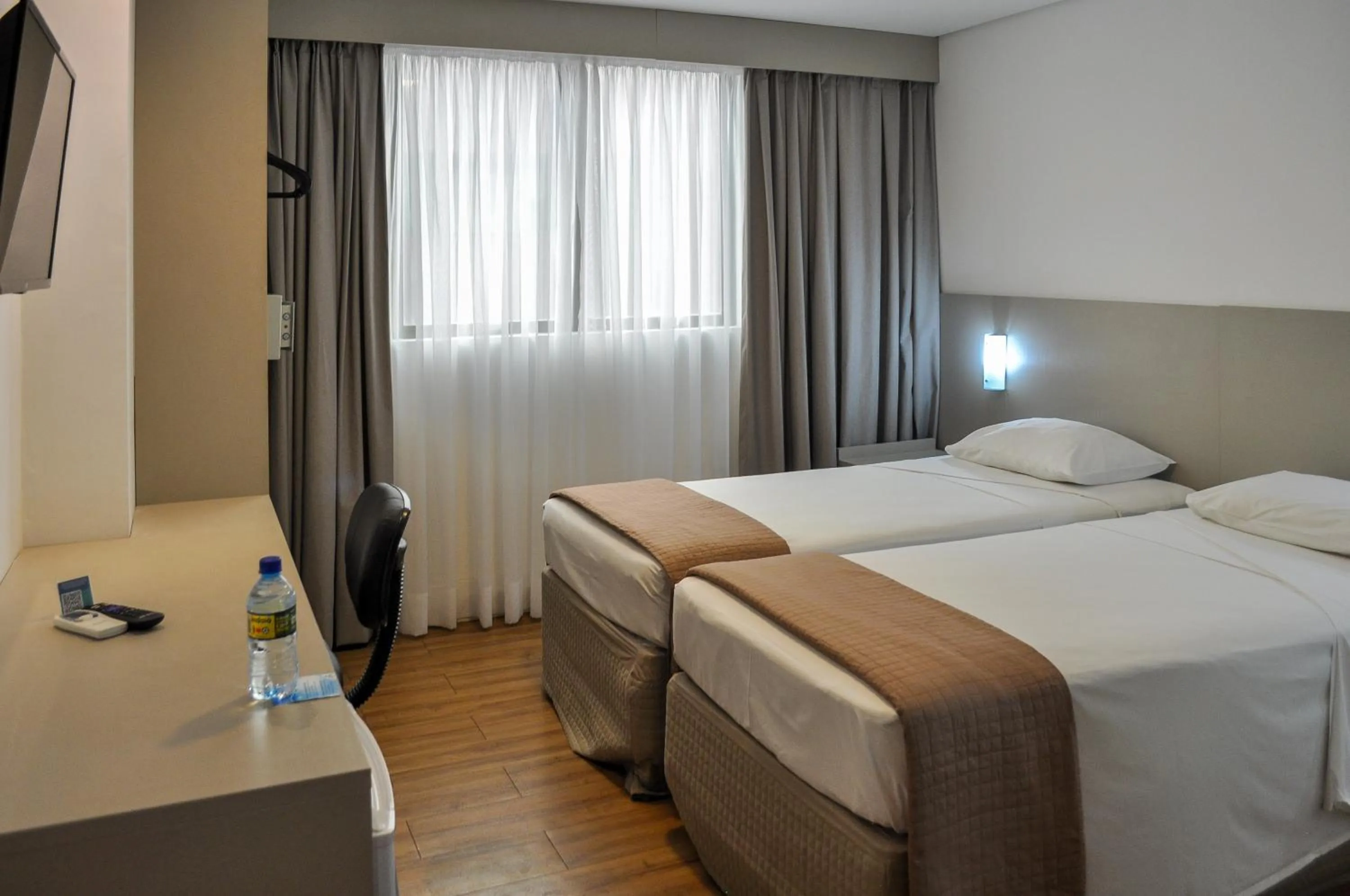 Bed in Marante Executive Hotel