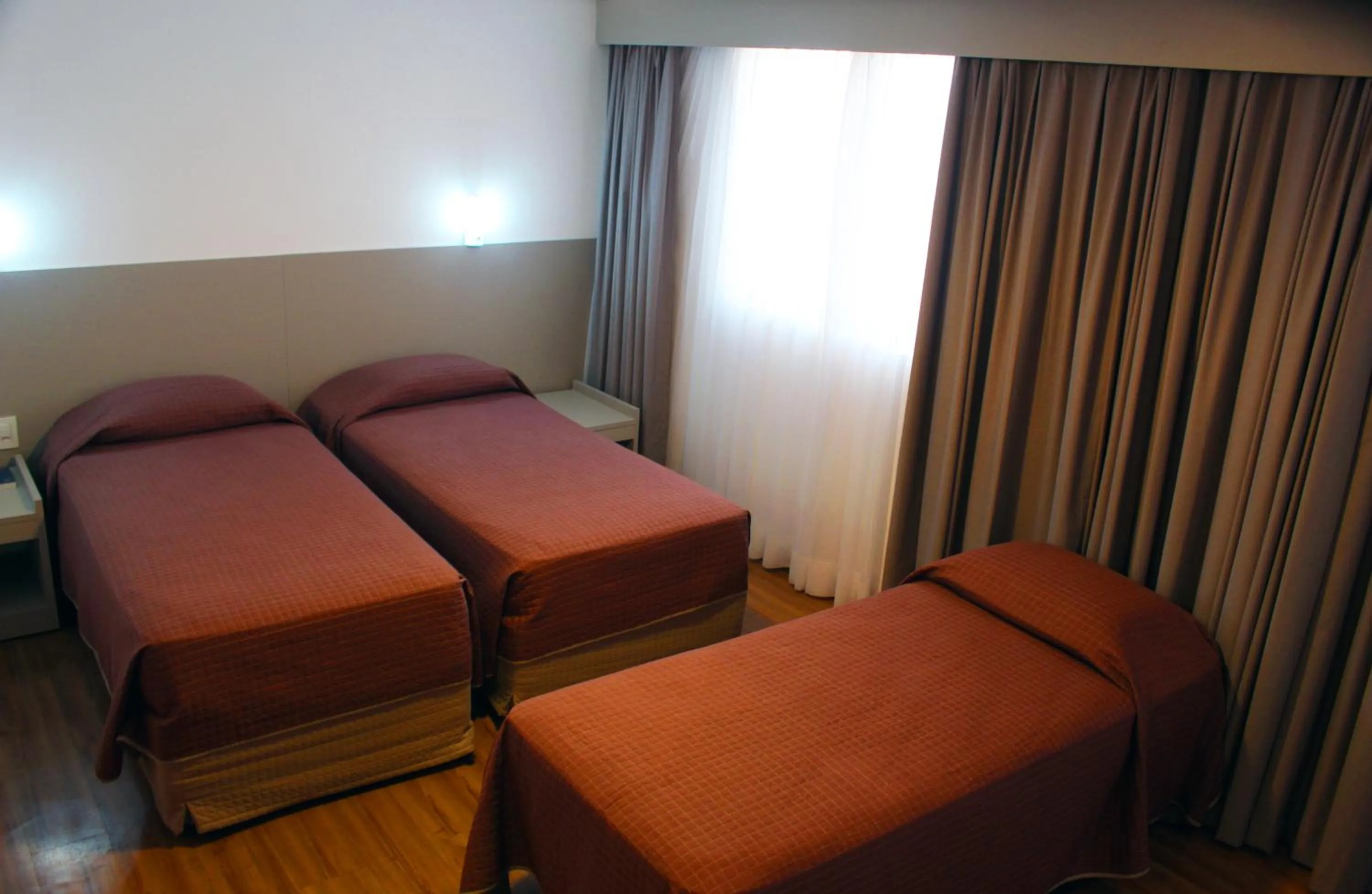 Bed in Marante Executive Hotel