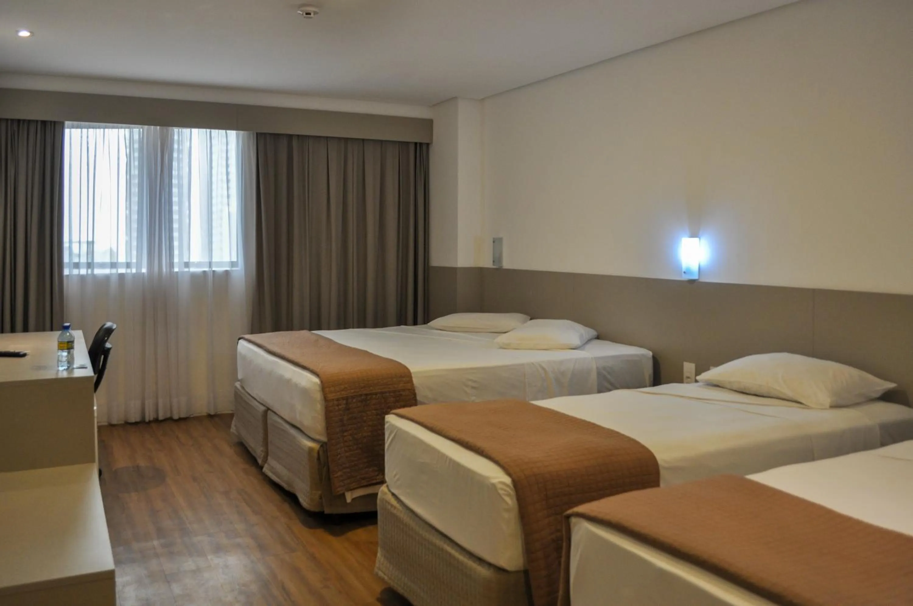 Bed in Marante Executive Hotel