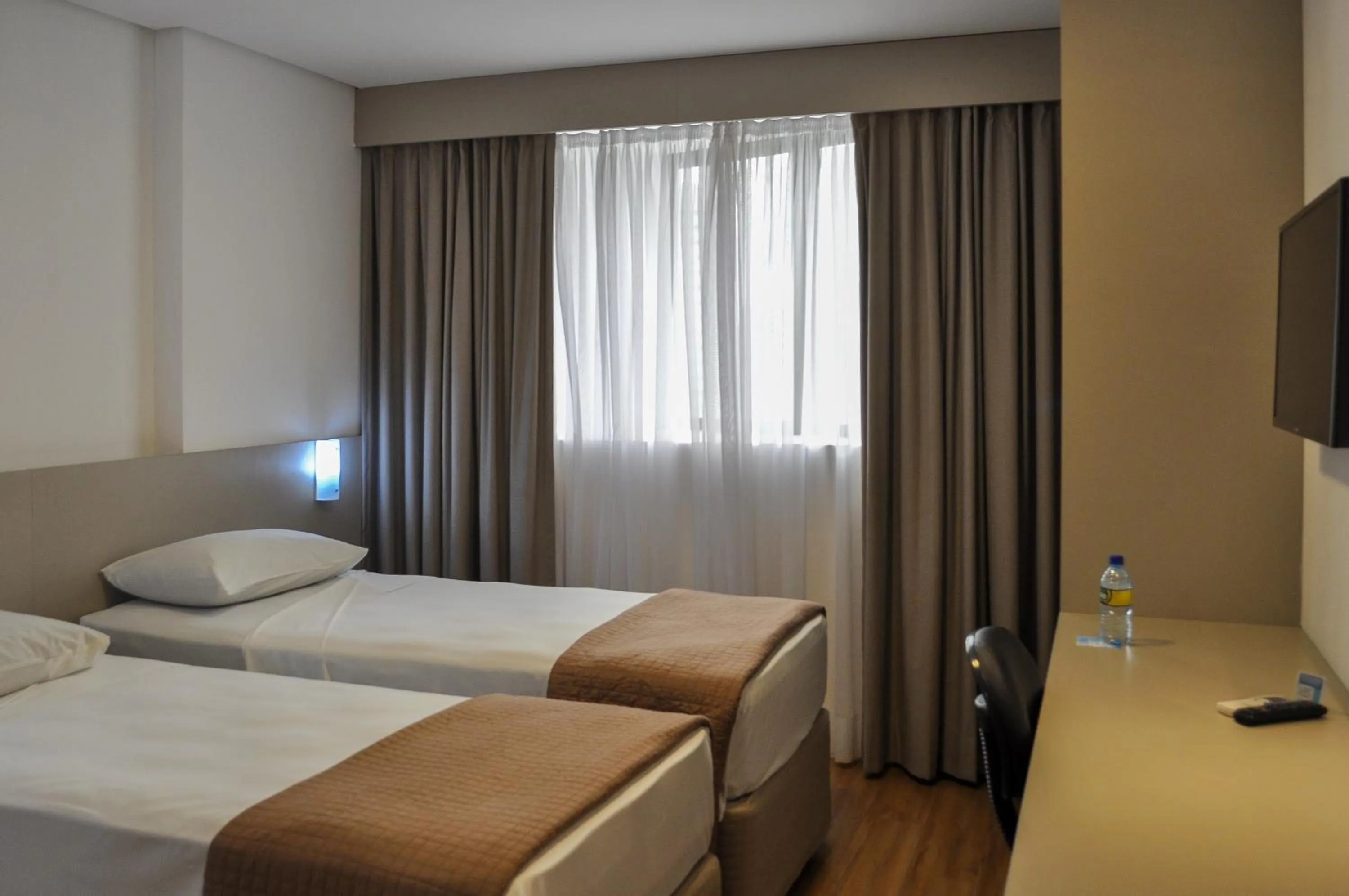 Bed in Marante Executive Hotel