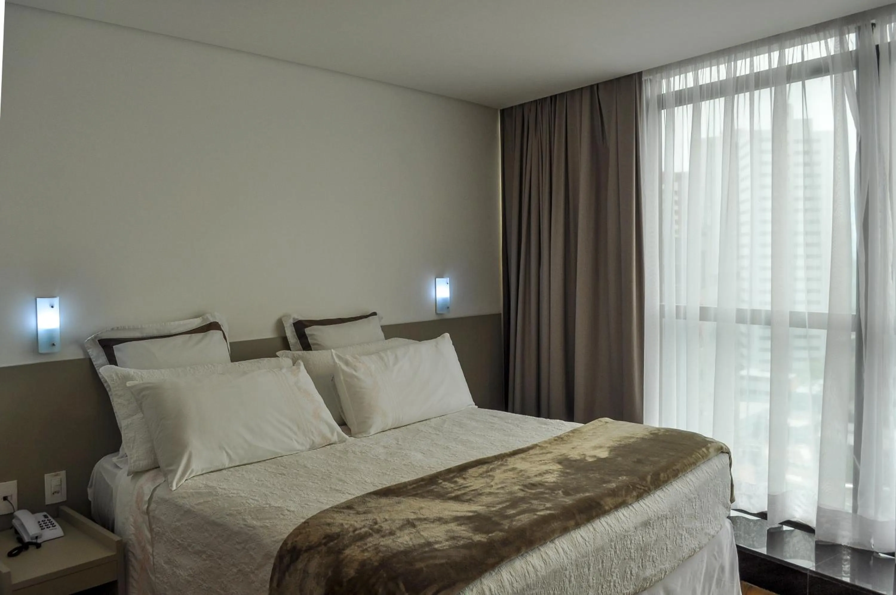 Bed in Marante Executive Hotel