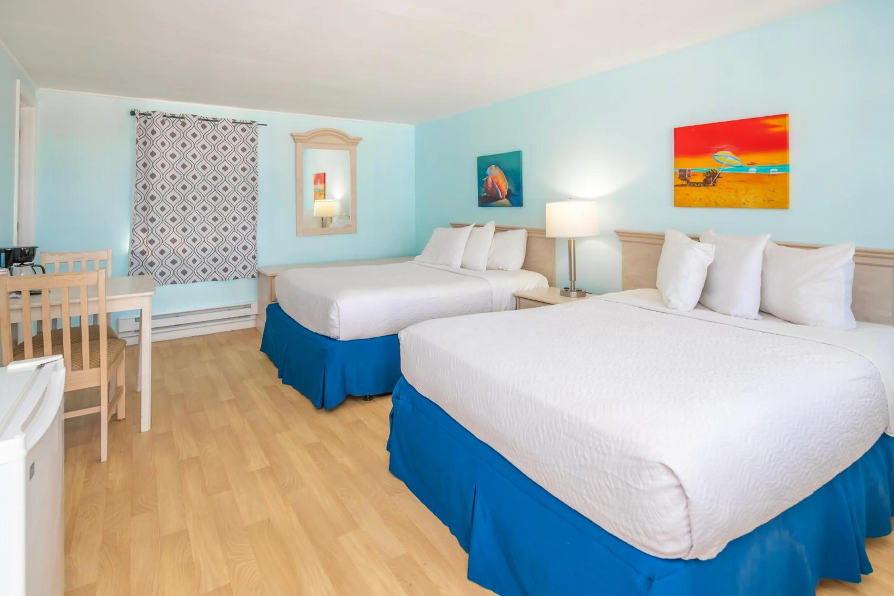 Bed in Drifting Sands Oceanfront Hotel