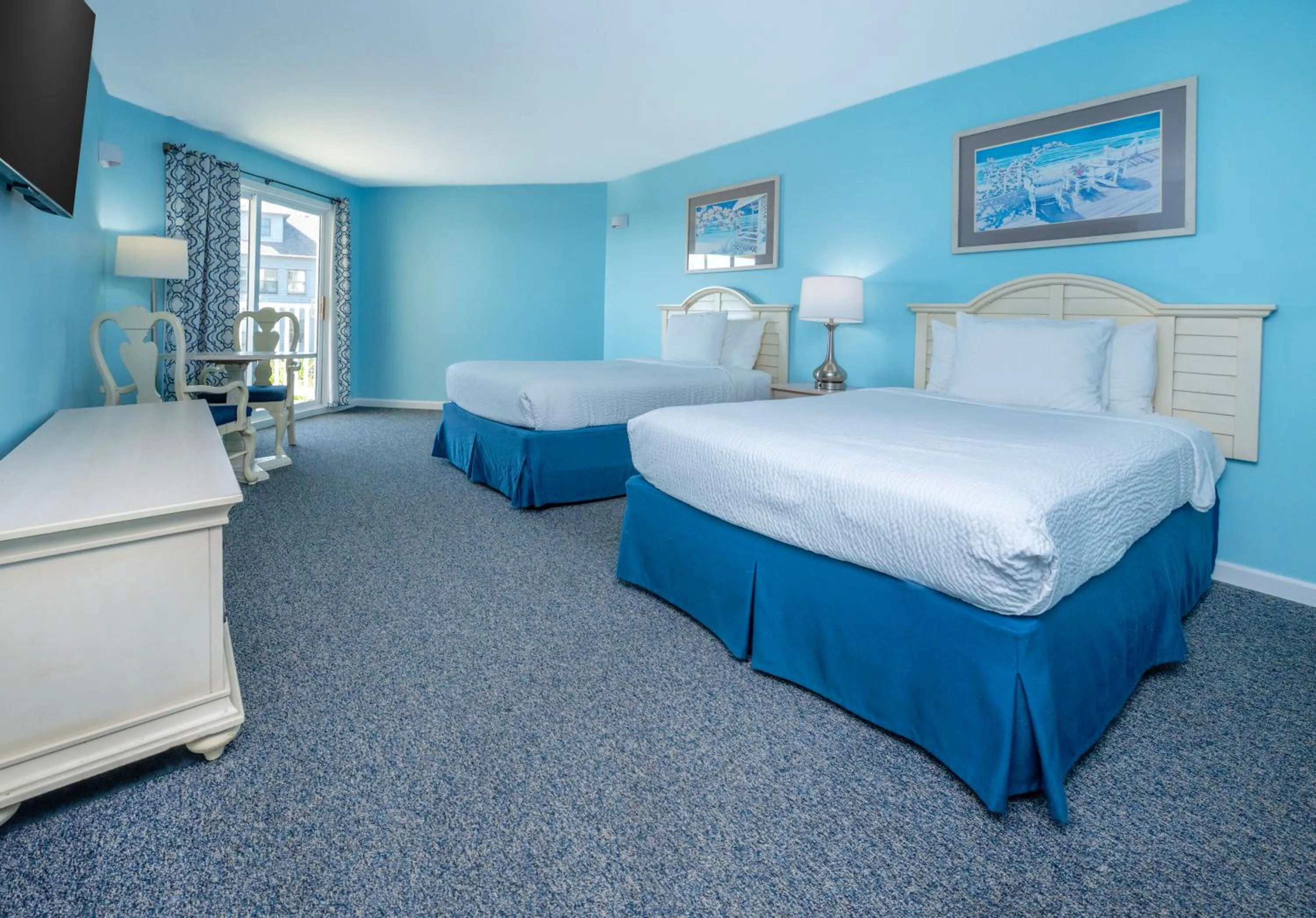 Bed in Drifting Sands Oceanfront Hotel