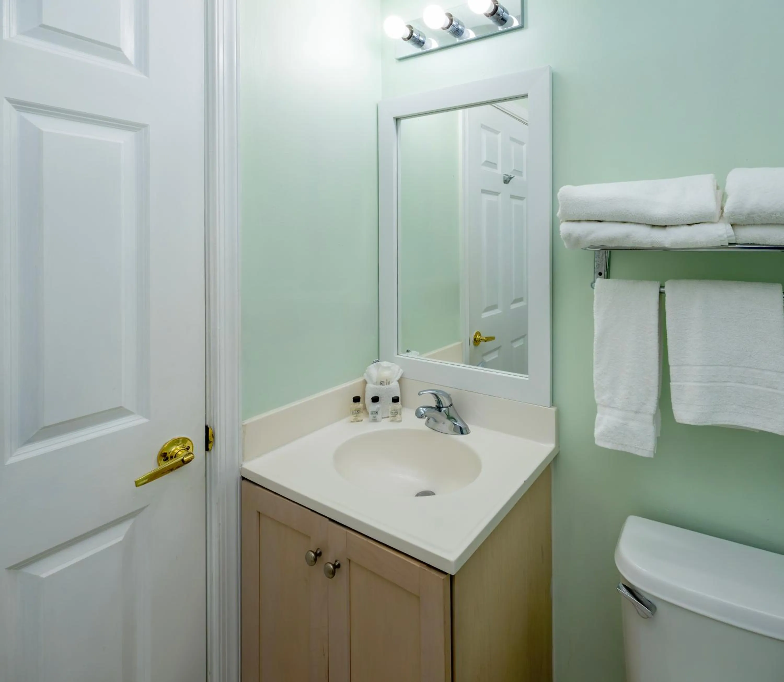 Toilet in Drifting Sands Oceanfront Hotel