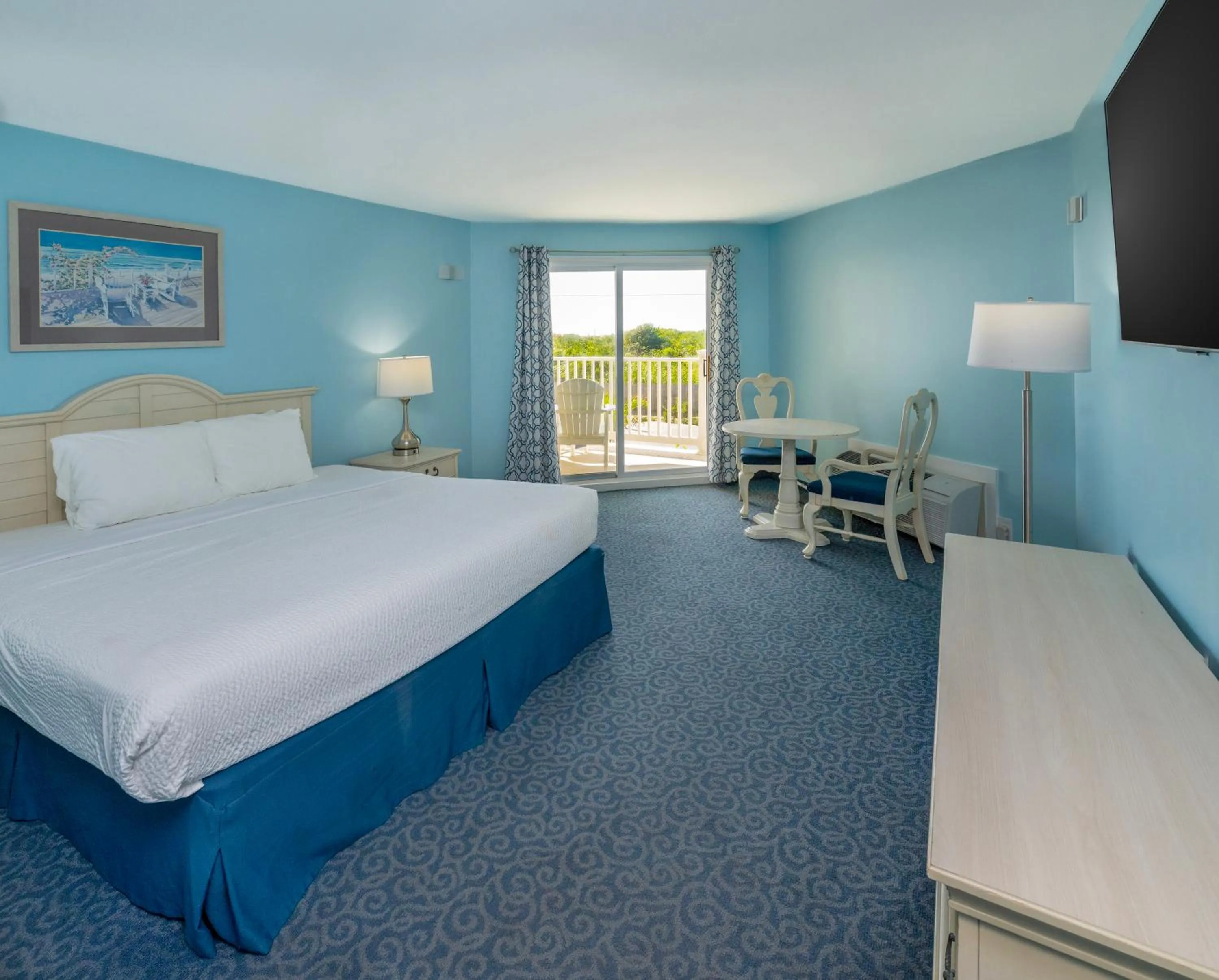 Bed in Drifting Sands Oceanfront Hotel