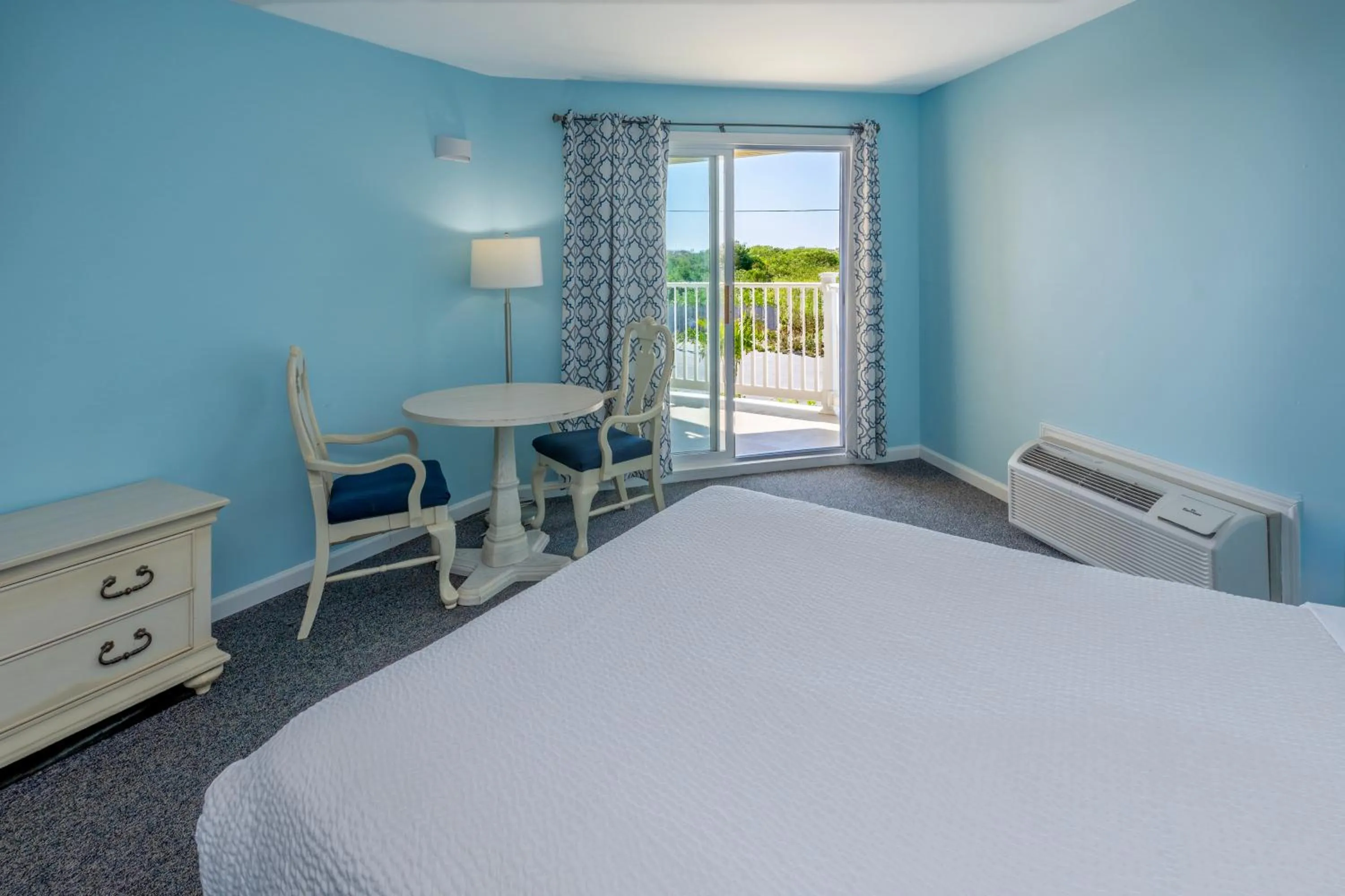 Bed in Drifting Sands Oceanfront Hotel