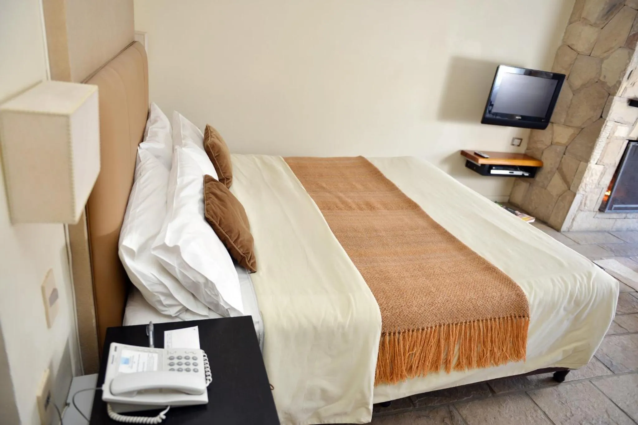 Bed in Galileo Boutique Hotel