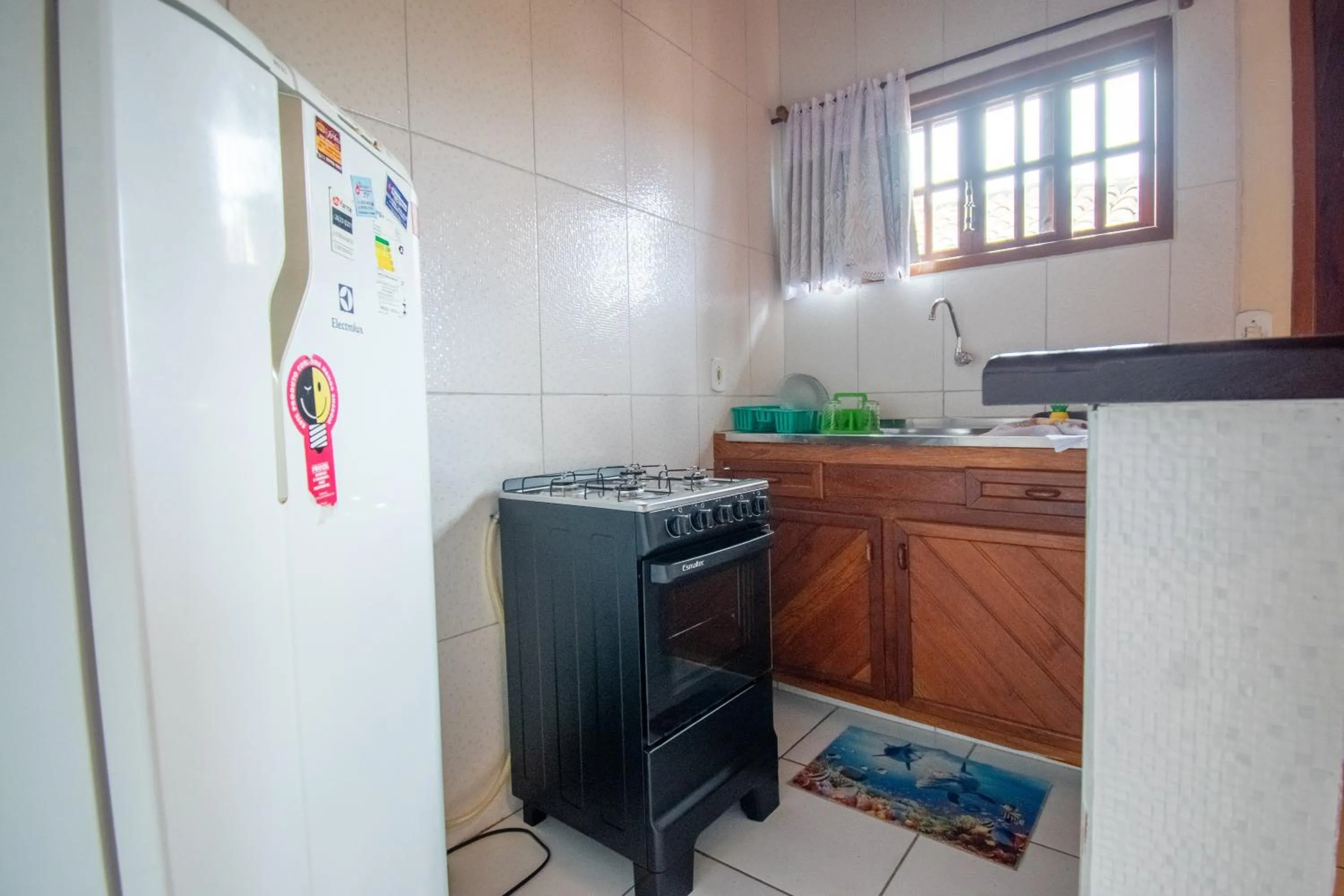 Kitchen or kitchenette in Flats Tartaruga Búzios