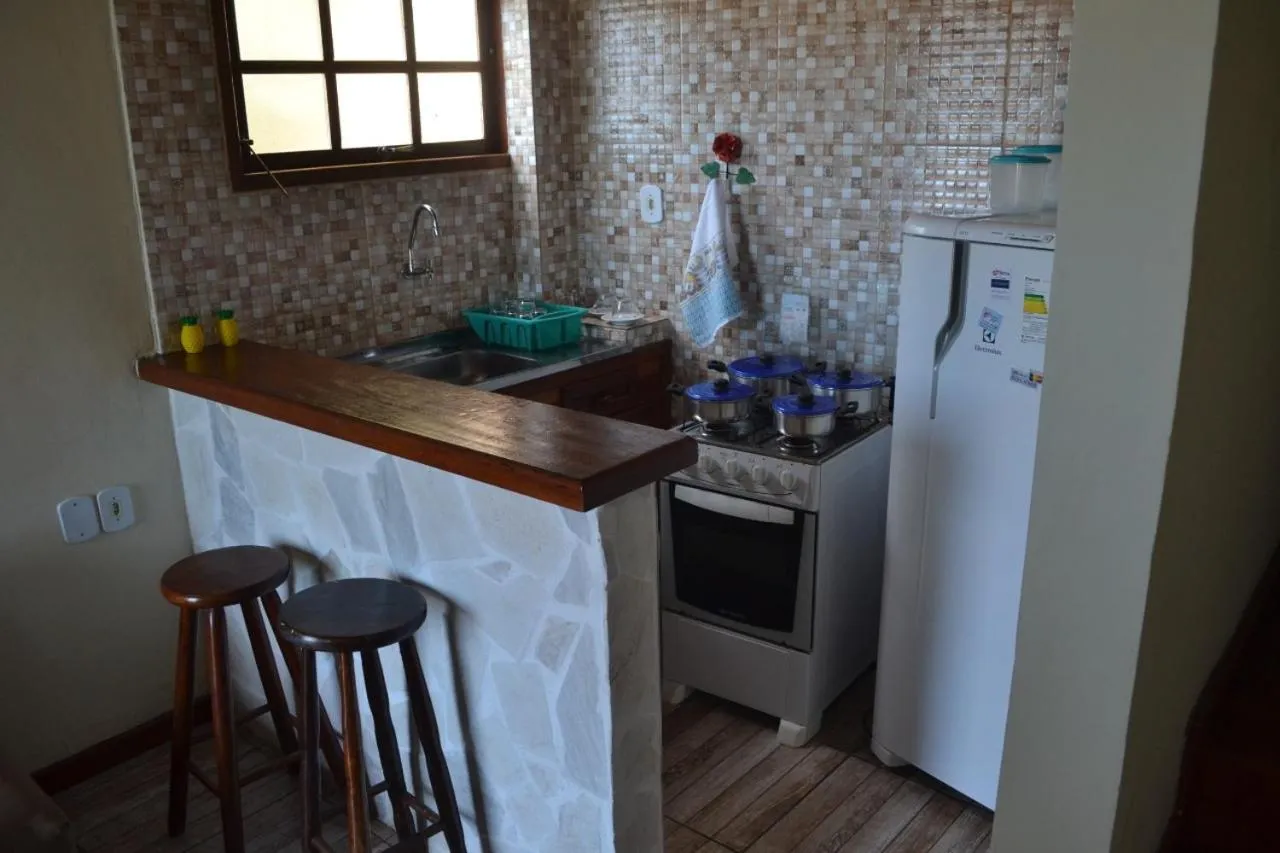 Kitchen or kitchenette in Flats Tartaruga Búzios