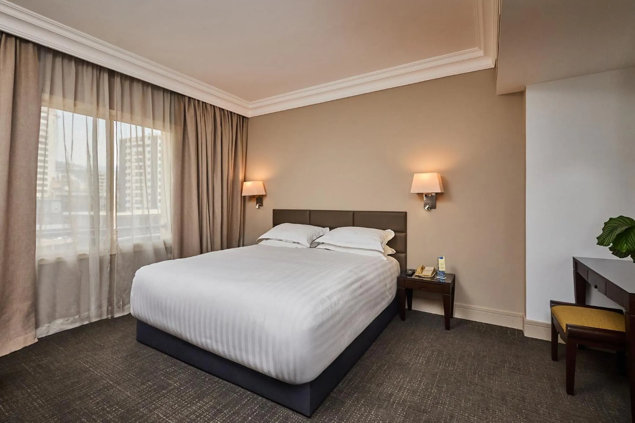 Bed in Portemilio Hotel & Resort