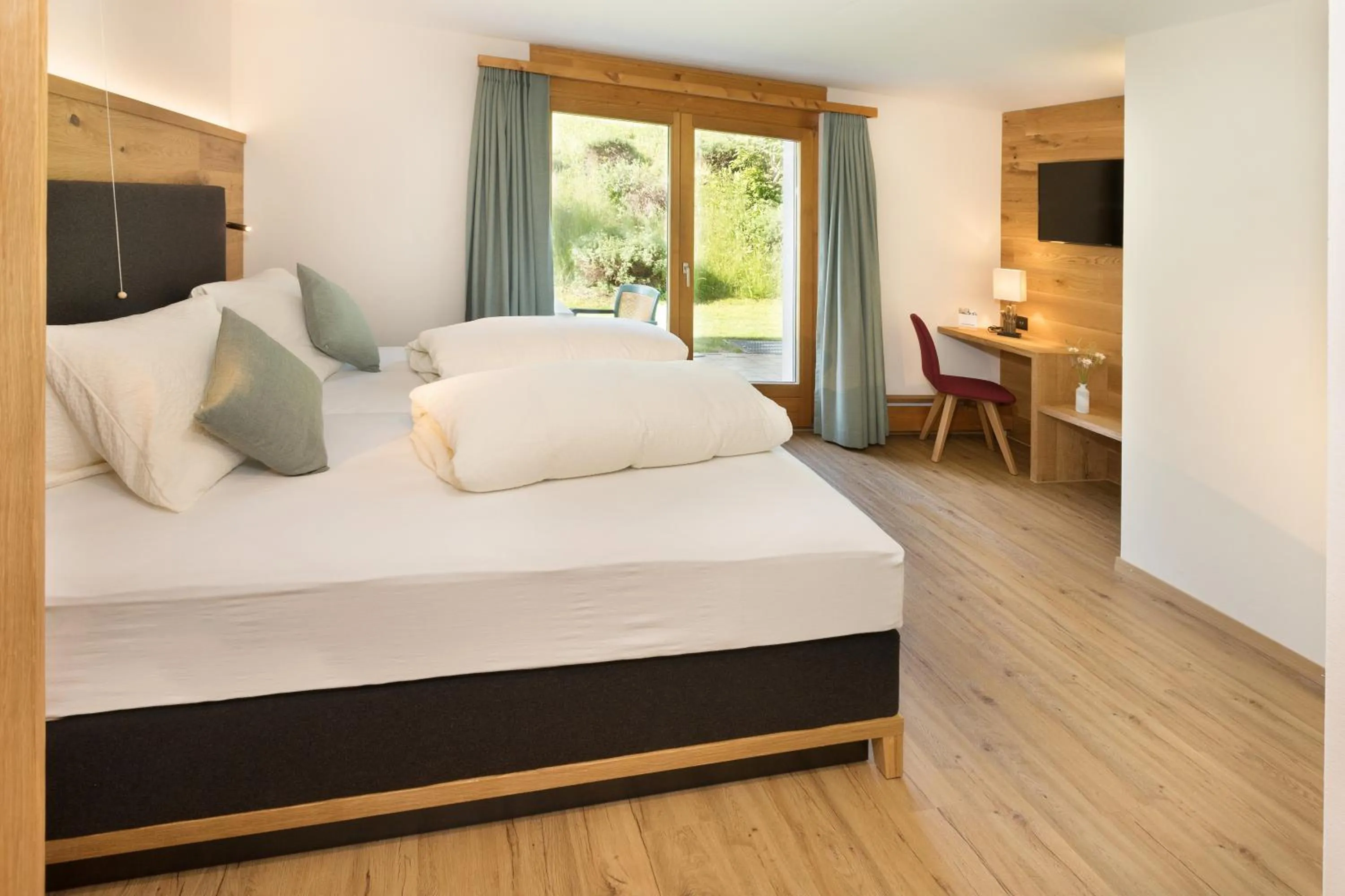 Photo of the whole room, Bed in Boutique-Hotel Vincenz