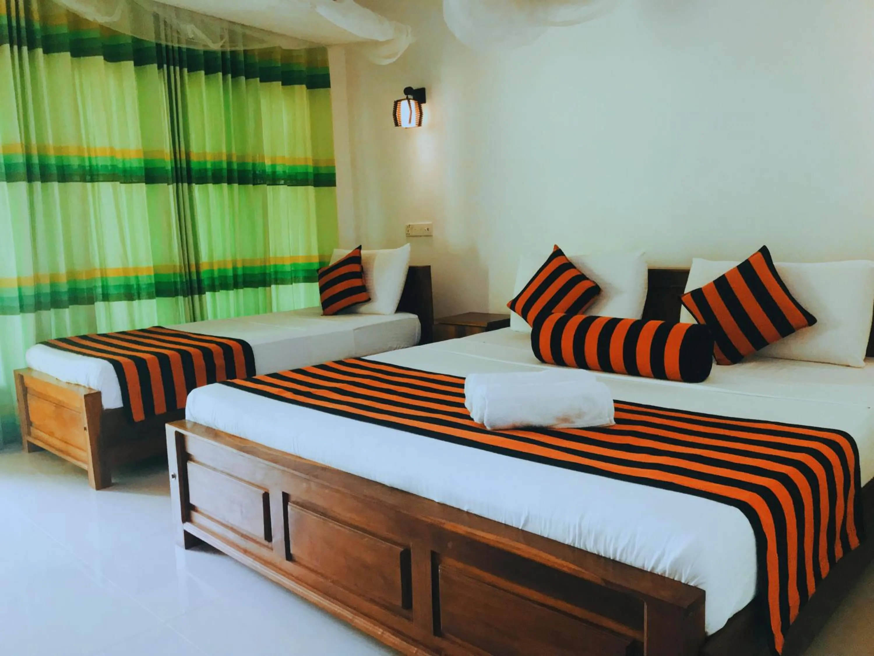 Bed in Sigiriya Ranasinghe Nature Villa & Cabana