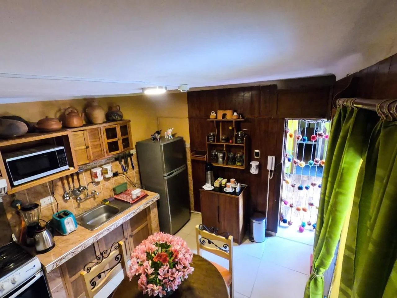 Kitchen or kitchenette in Casa Saphi