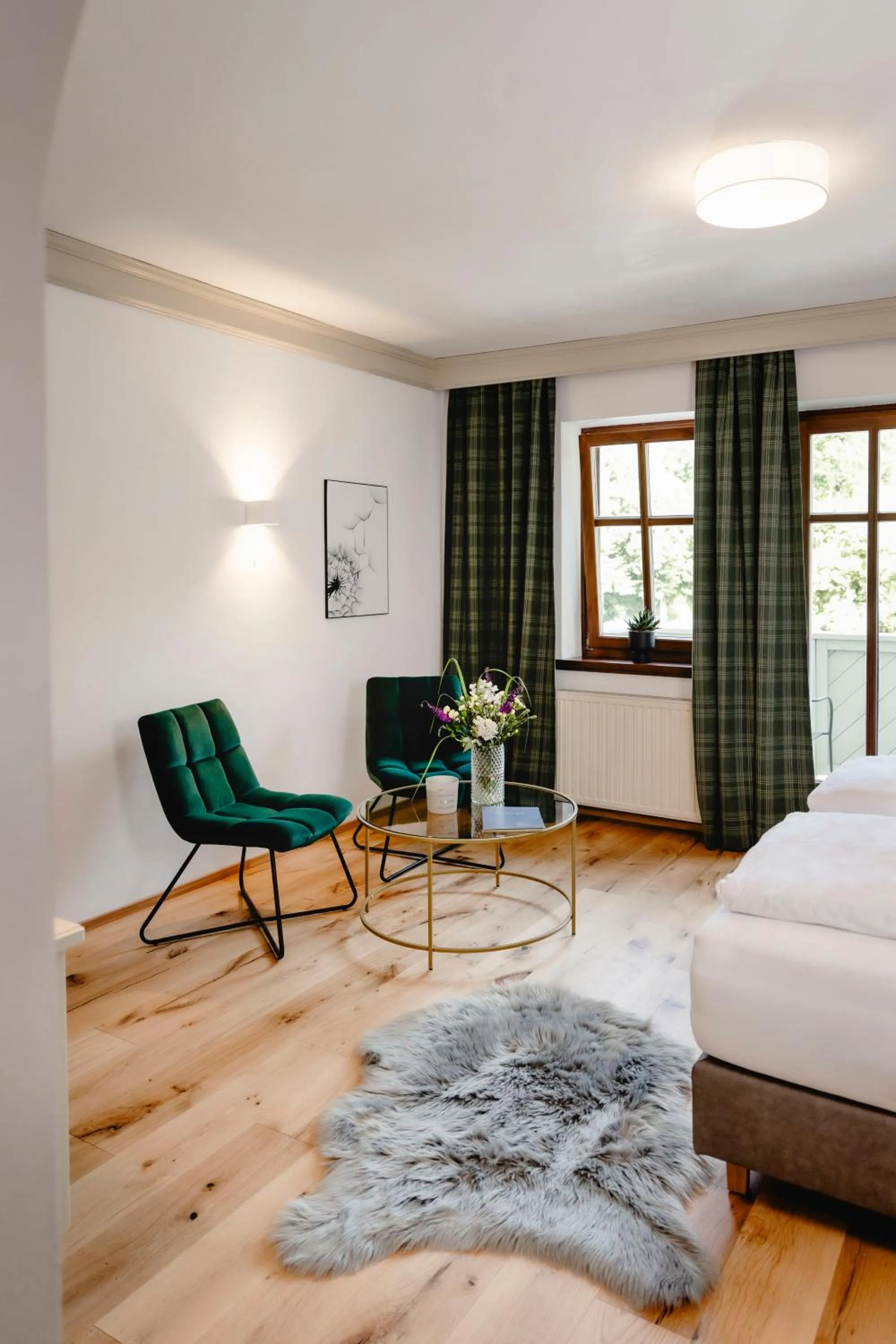 Seating area, Bed in Boutiquehotel Hubertushof