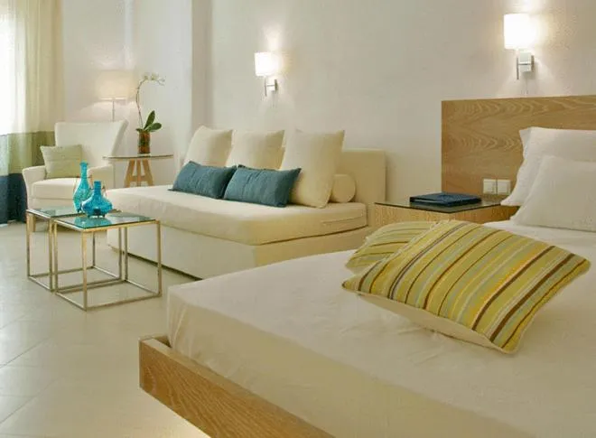 Bedroom, Bed in Petasos Beach Resort & Spa - Small Luxury Hotels of the World