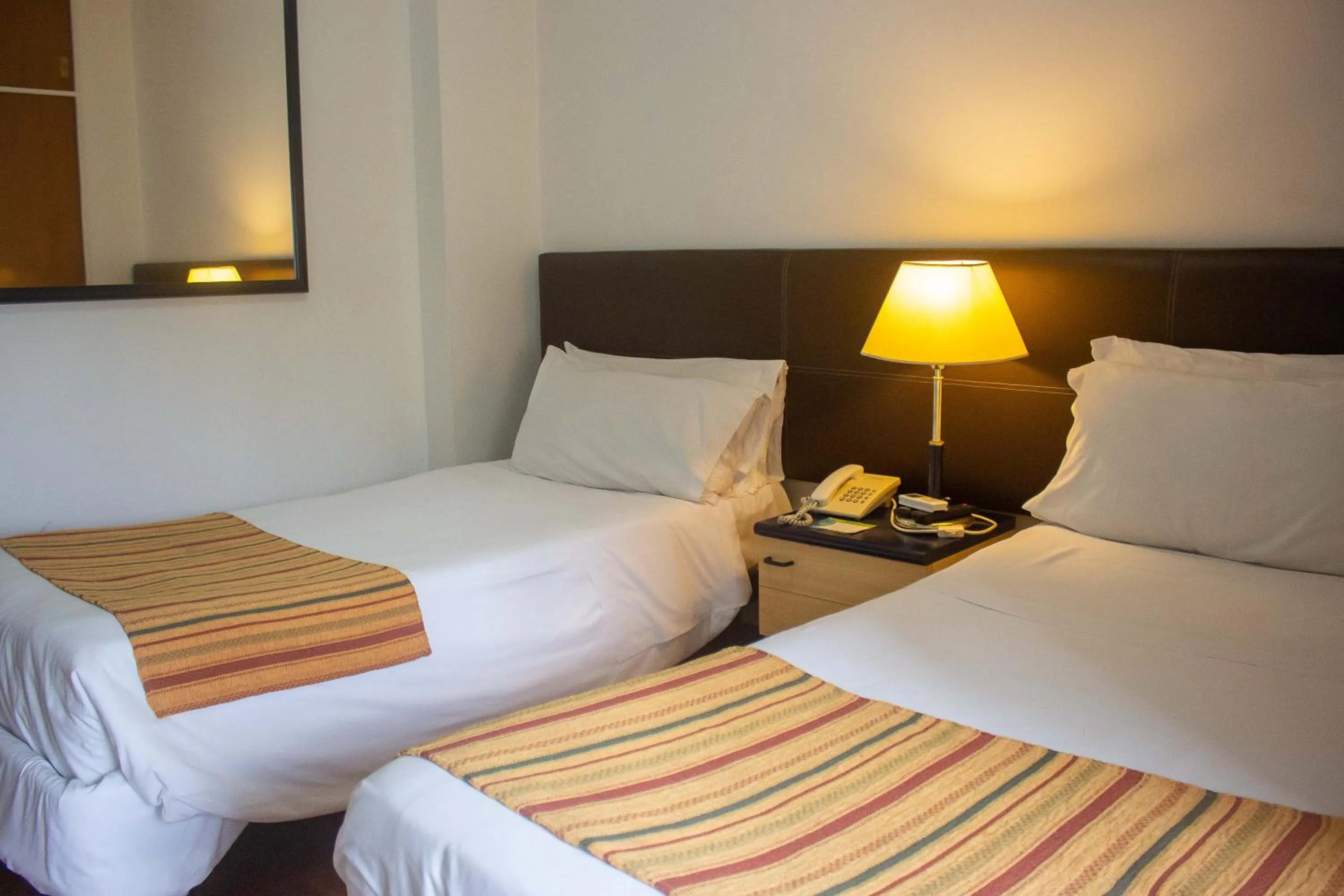 Bed in Hotel Cristoforo Colombo