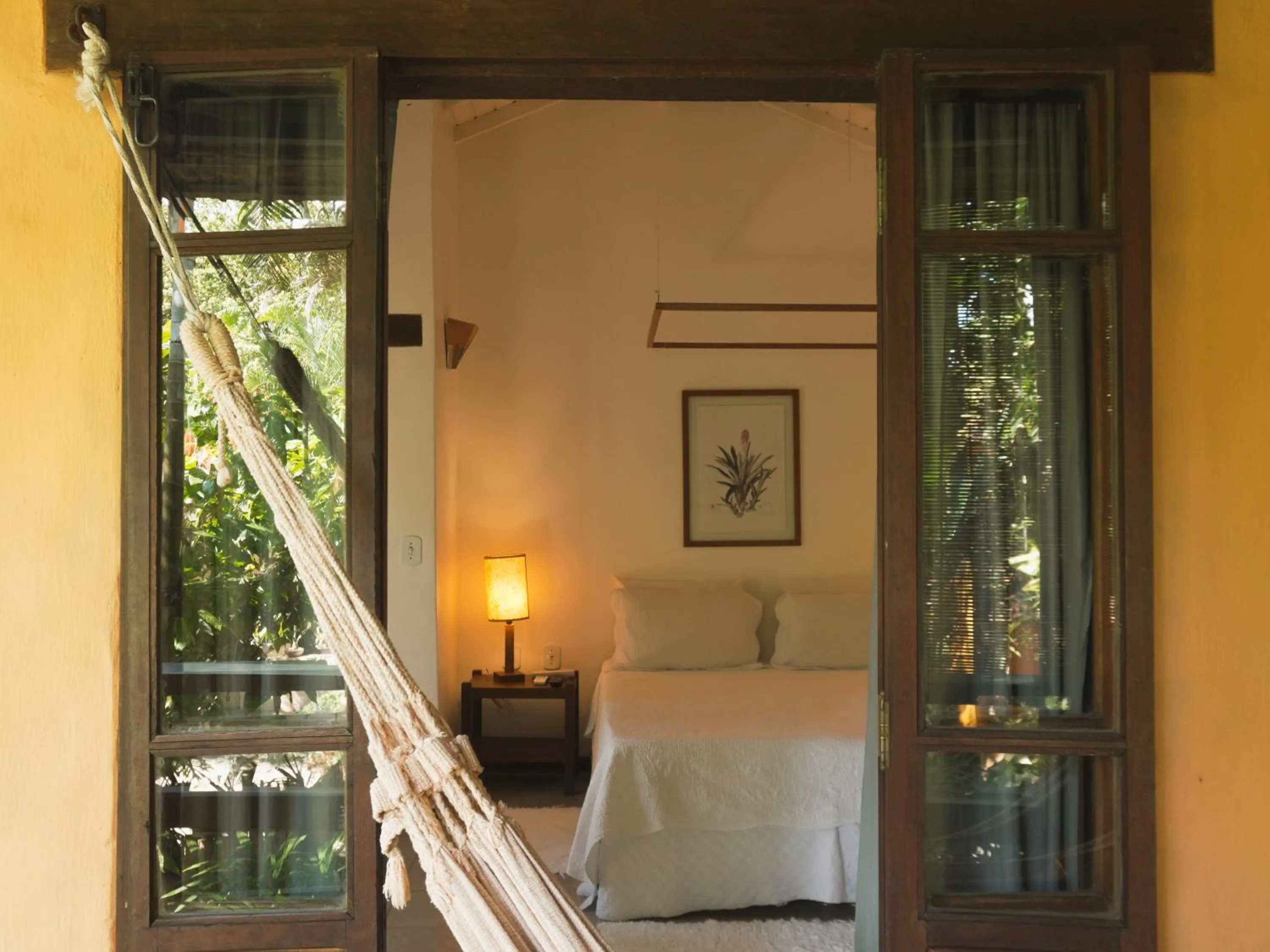 Bed in Pousada Erva Doce