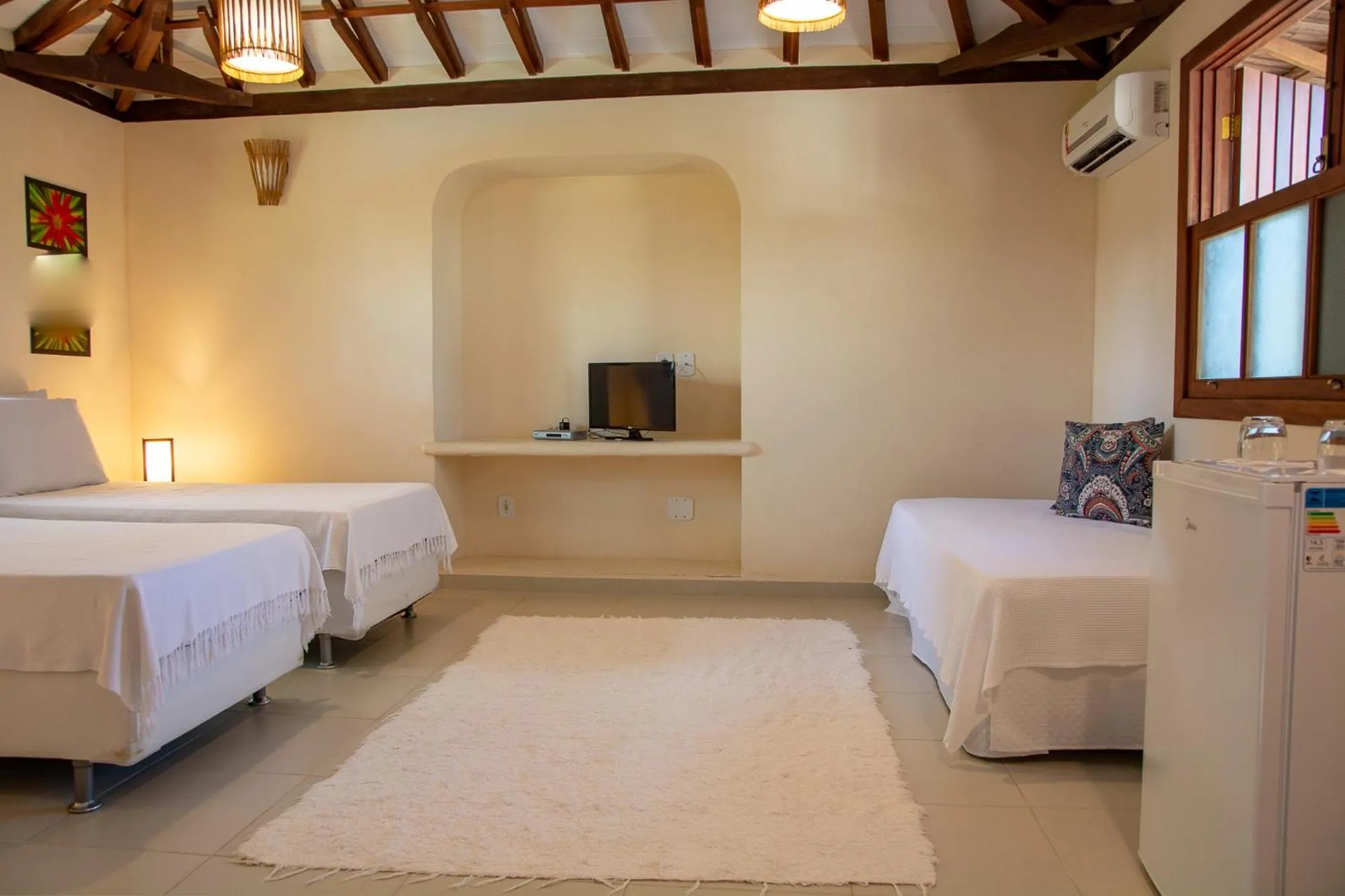 Bed in Pousada Erva Doce