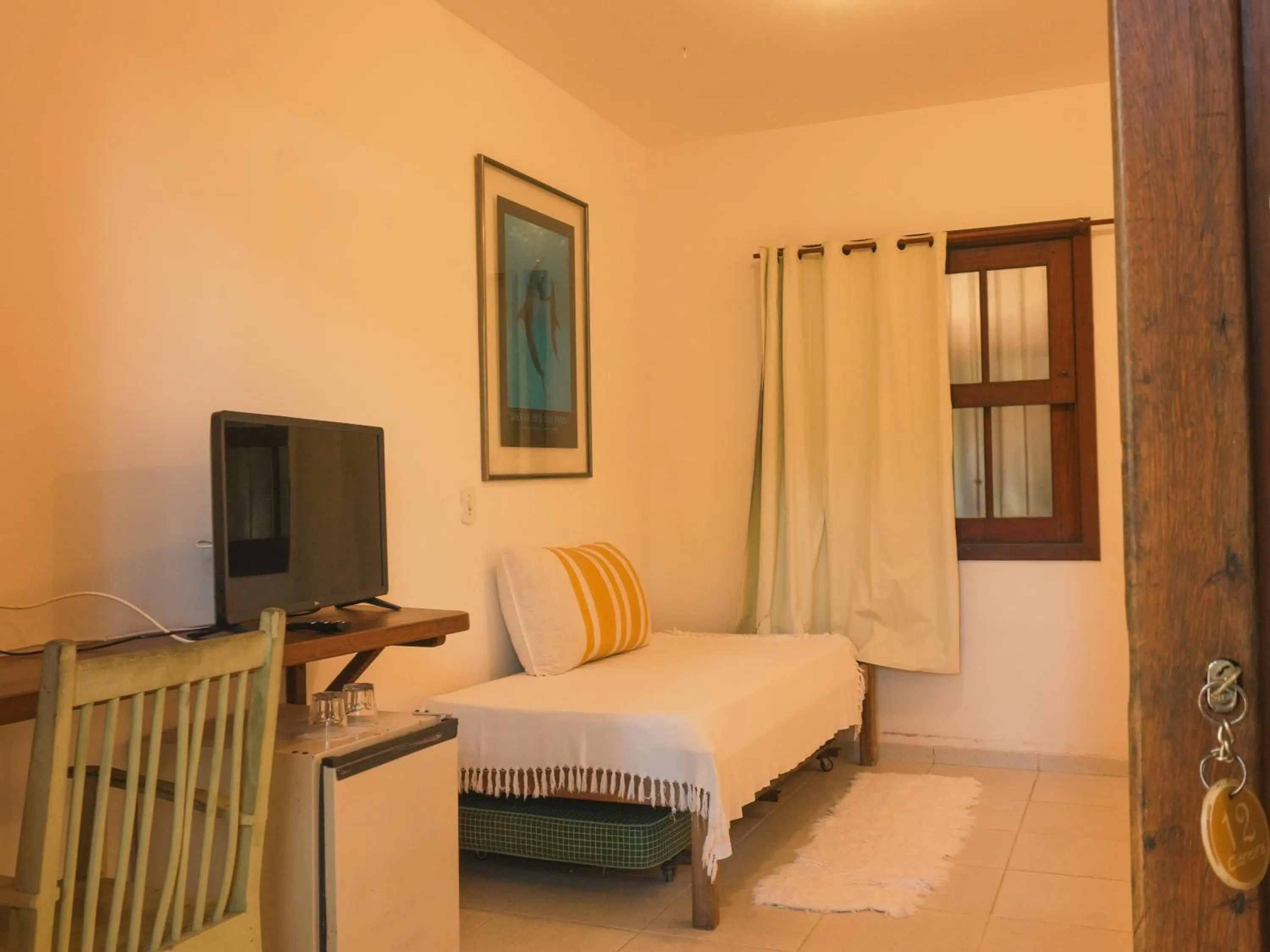 Bed in Pousada Erva Doce