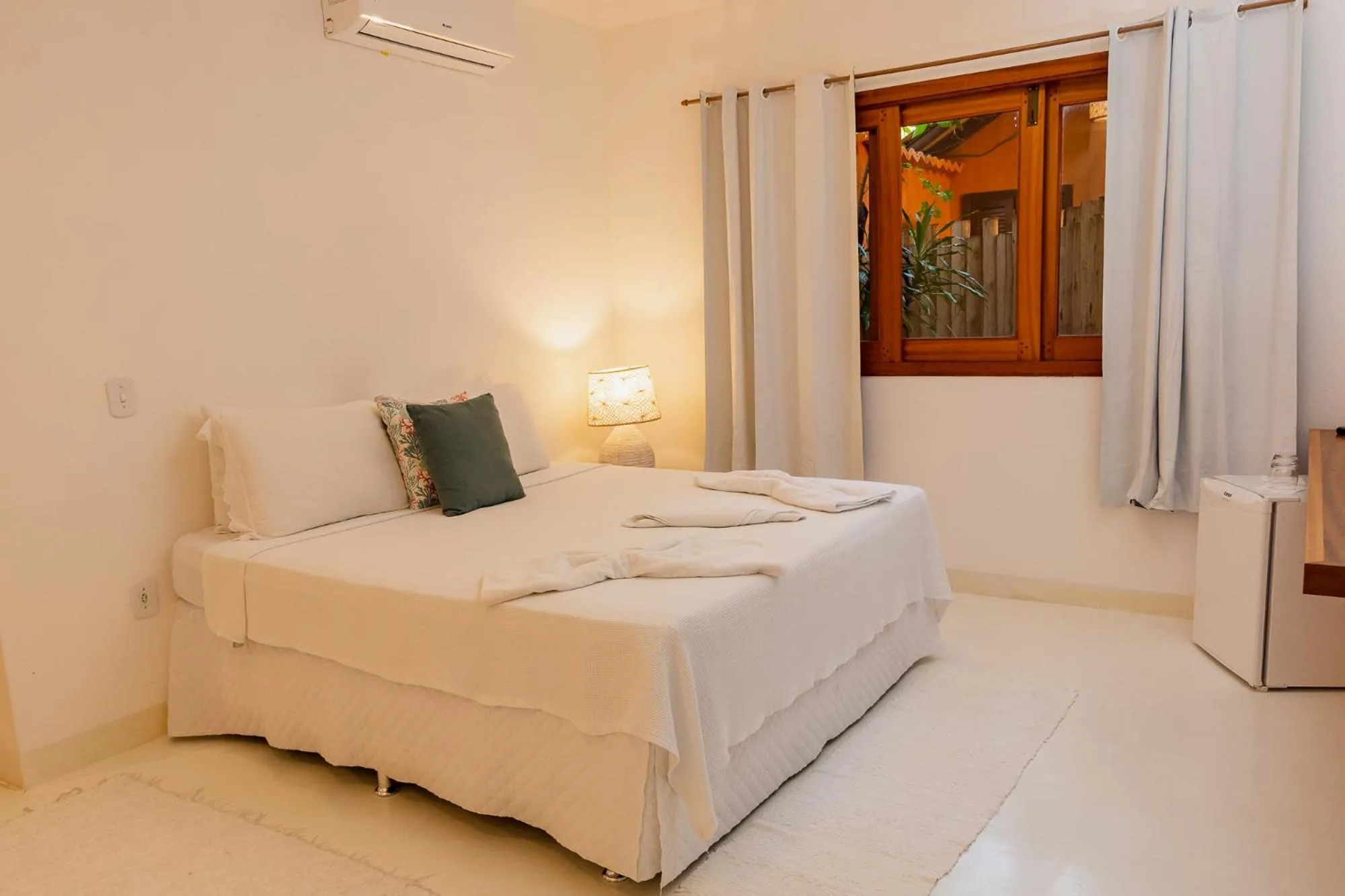 Bed in Pousada Erva Doce