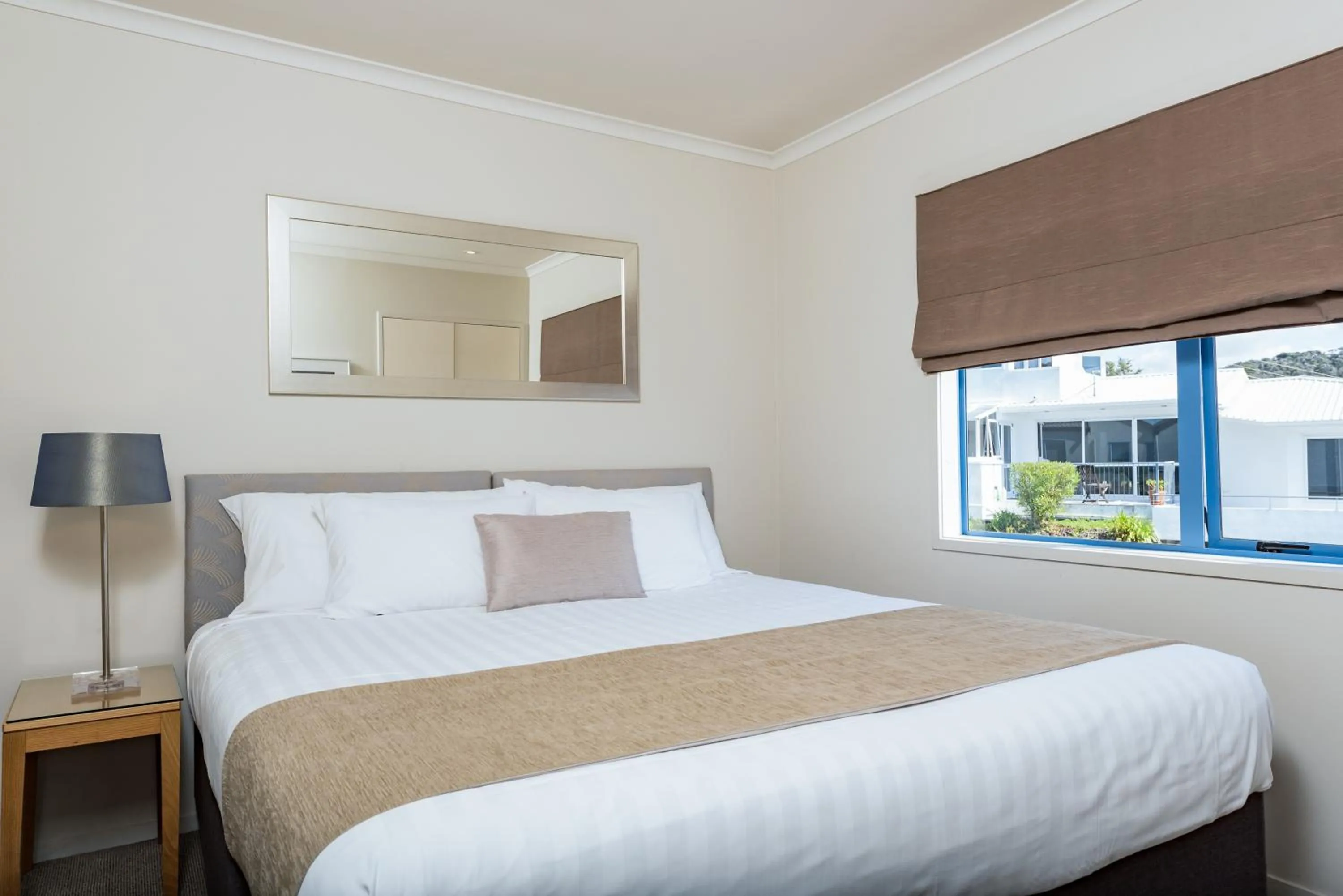 Bed in Blue Pacific Apartments