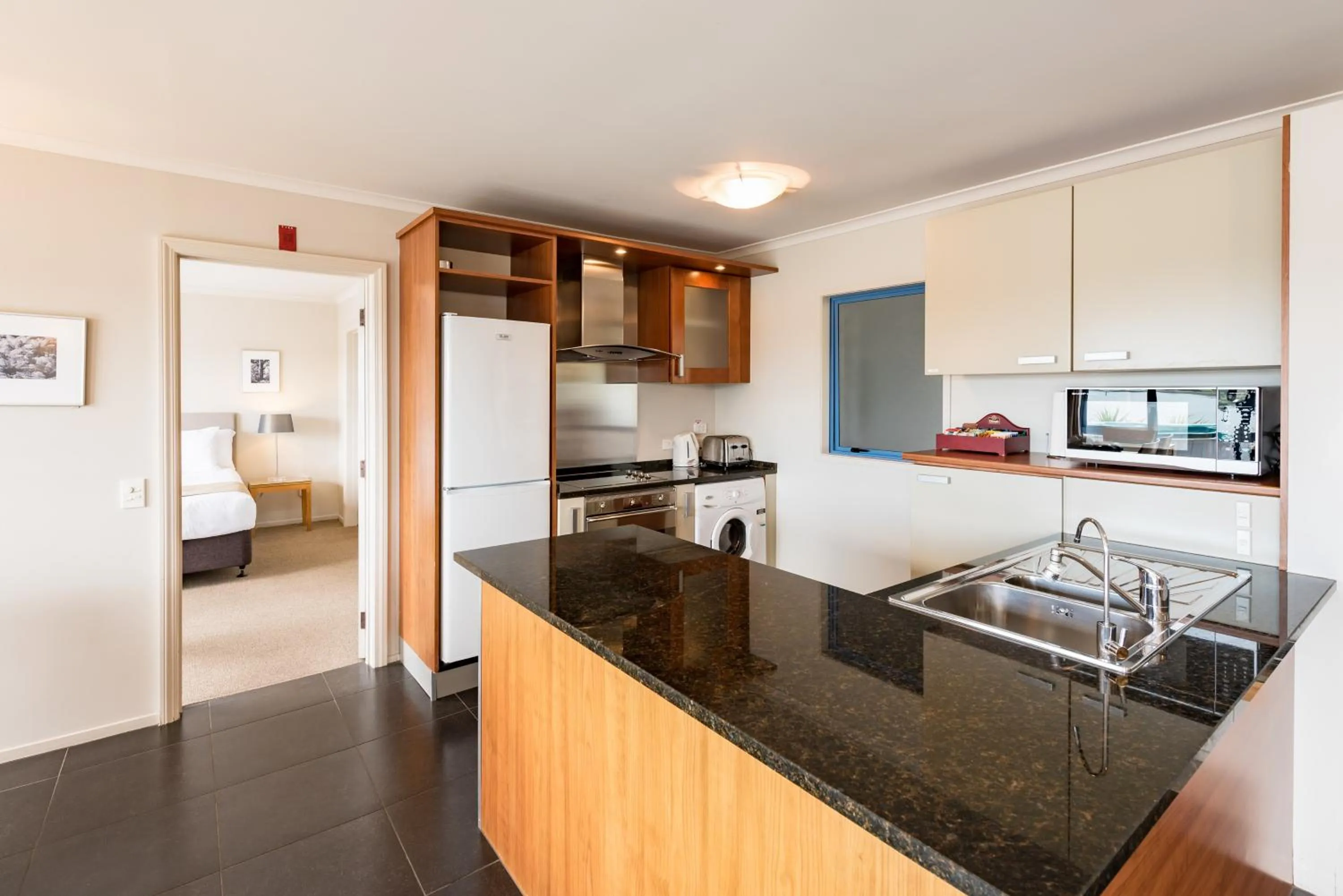 Kitchen or kitchenette in Blue Pacific Apartments