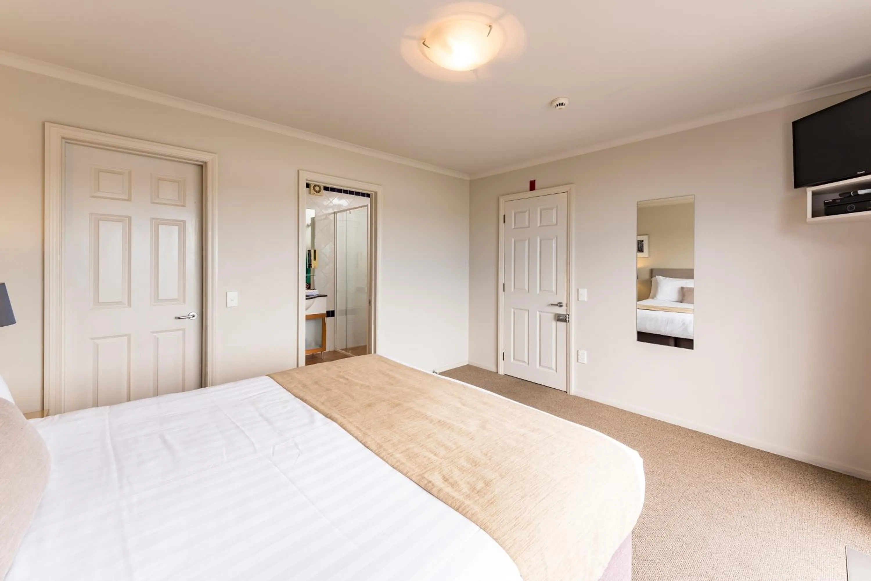 Bed in Blue Pacific Apartments