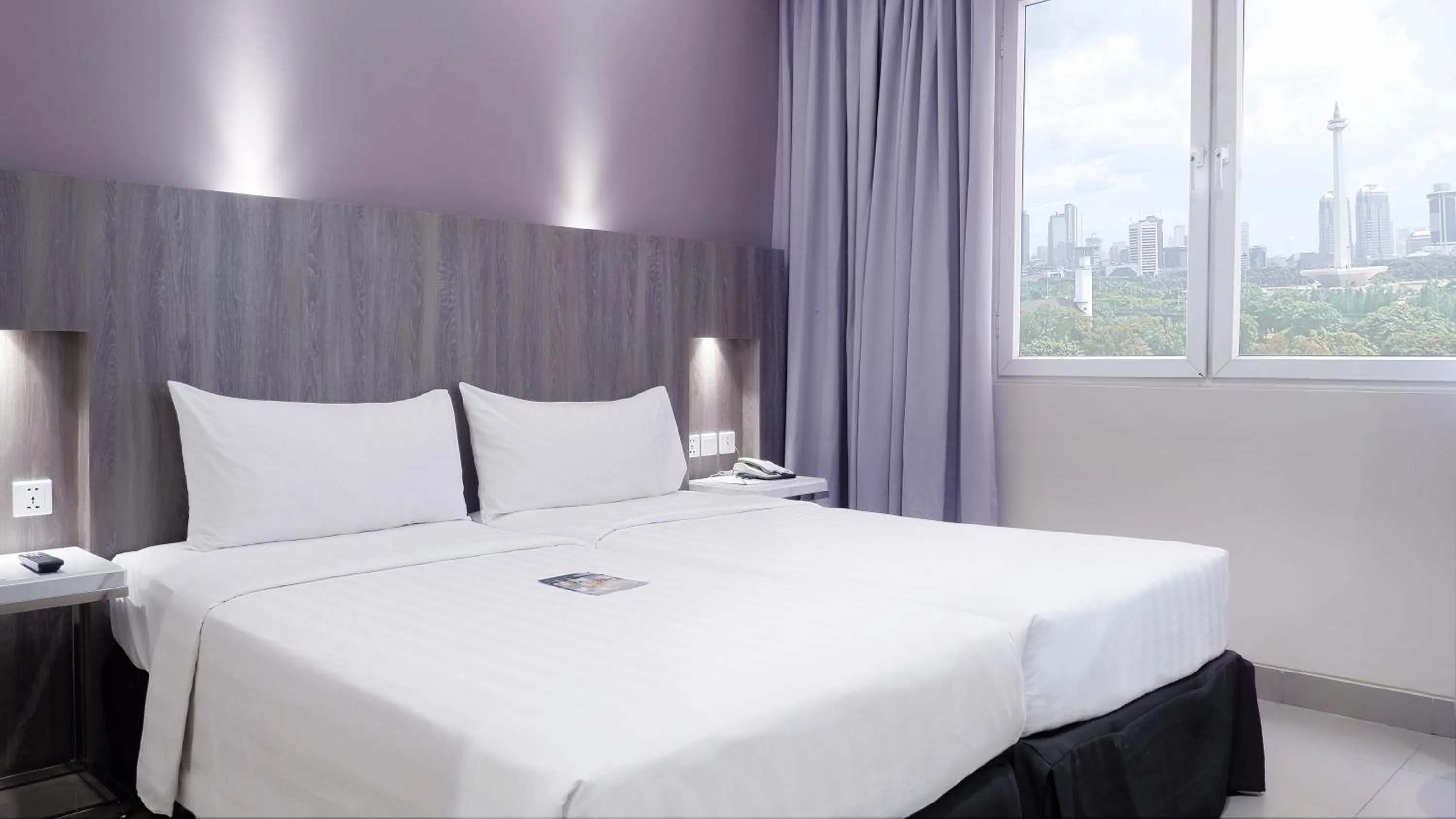 Bed in Royal Palm Hotel & Conference Center Cengkareng