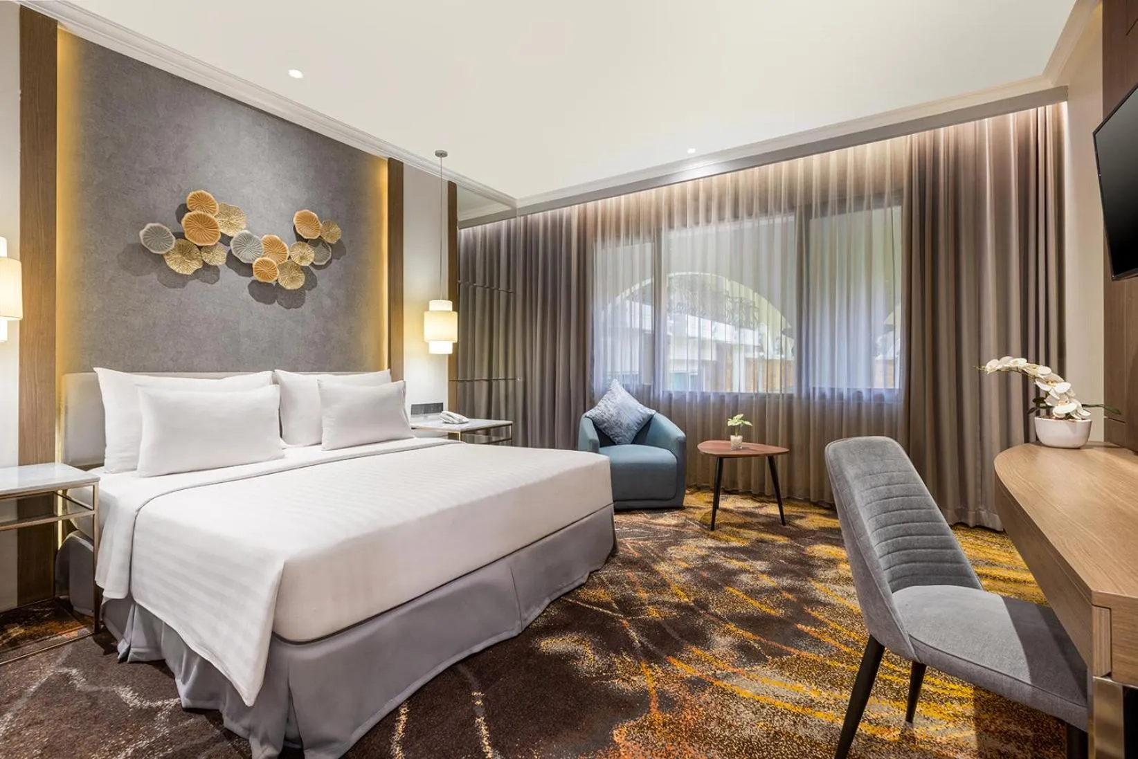 Bed in Aston Tropicana Hotel Bandung