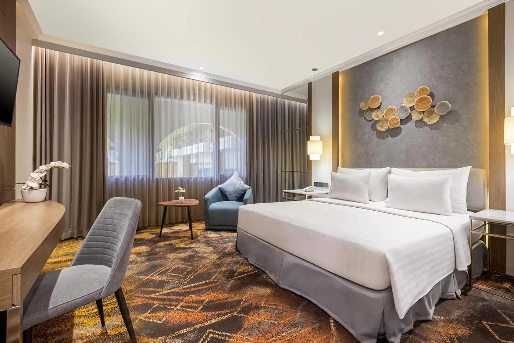 Bed in Aston Tropicana Hotel Bandung